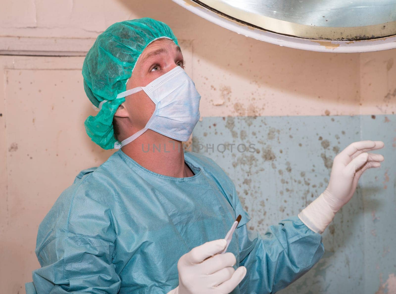 Surgeon praying to god before coming difficult surgery