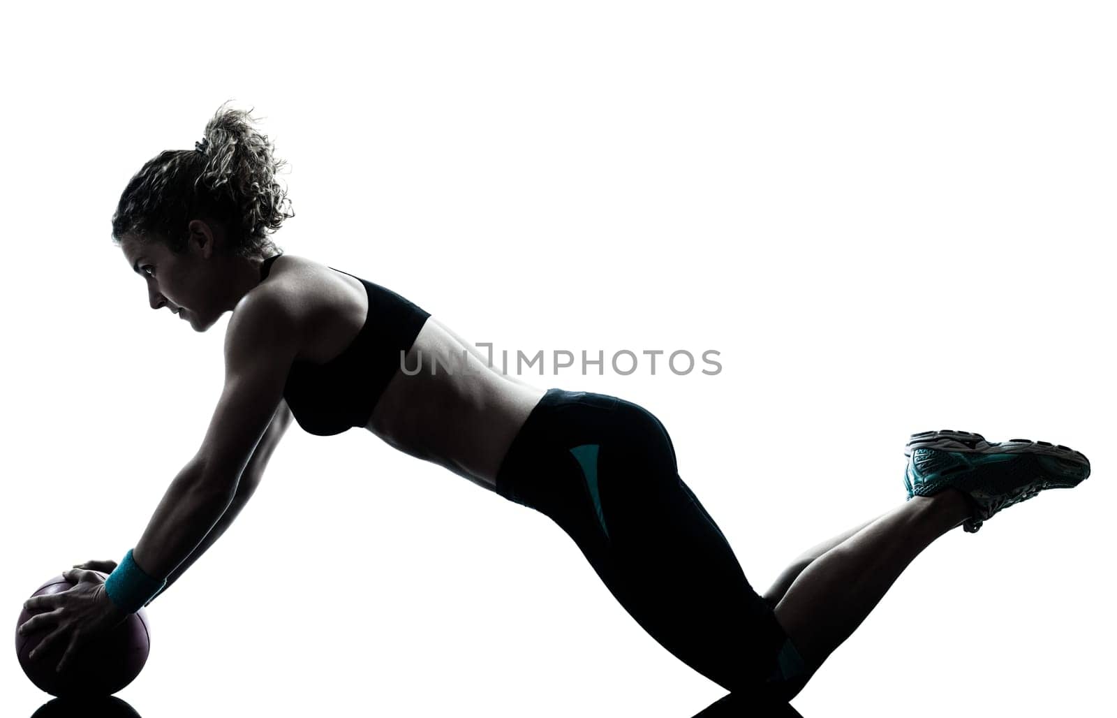 one caucasian woman exercising fitness ball workout posture in silhouette studio isolated on white background