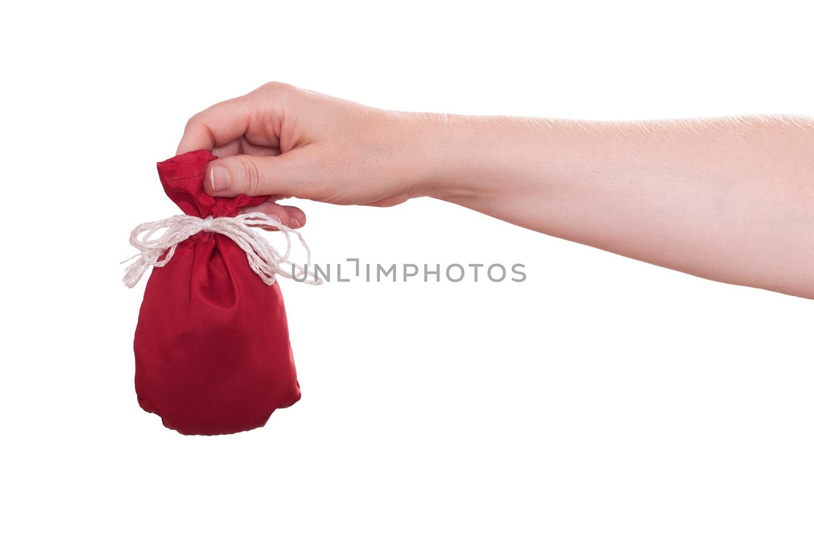 White isolated female hand holding a red pouch