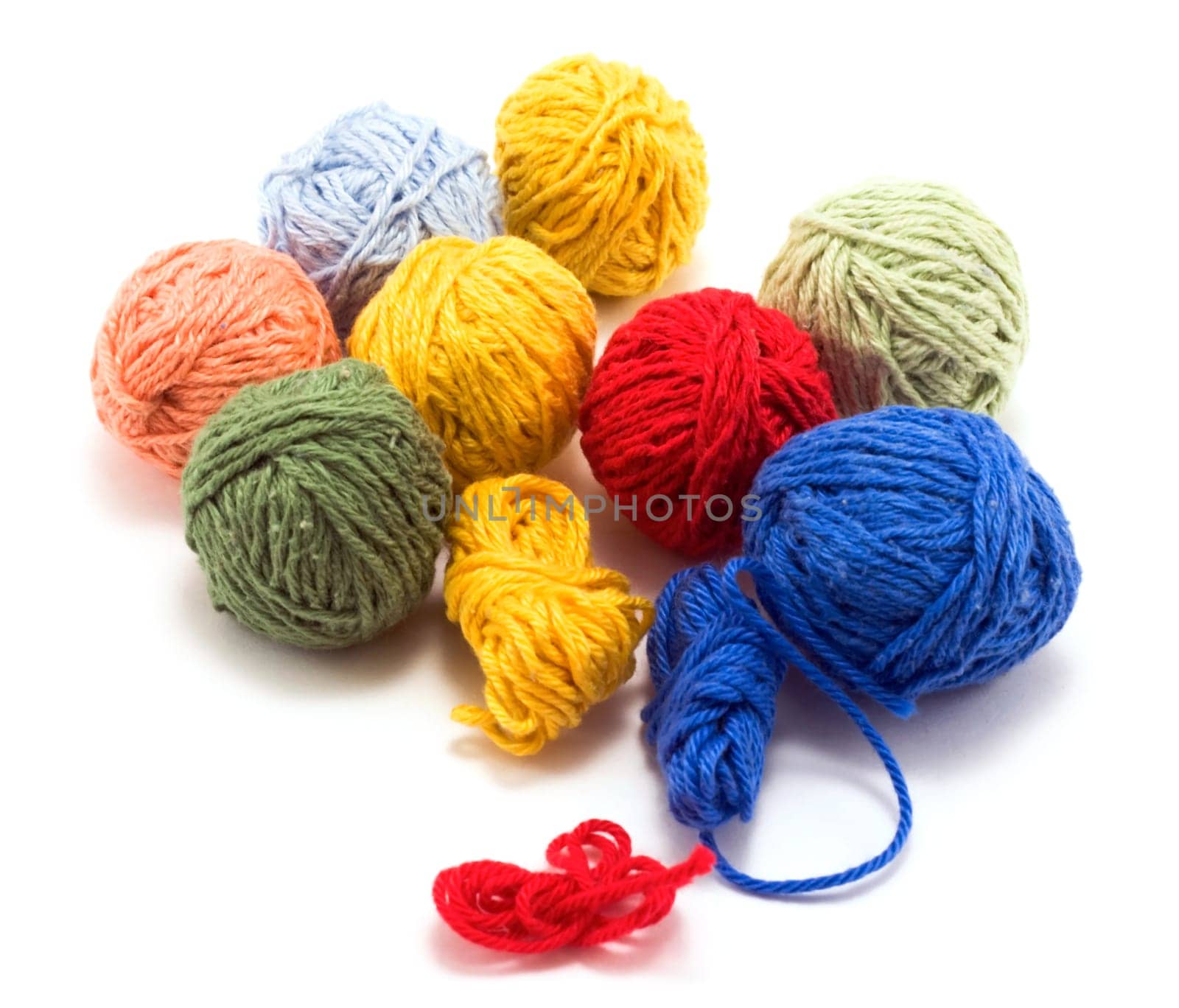 Ball of the colour threads insulated on white background