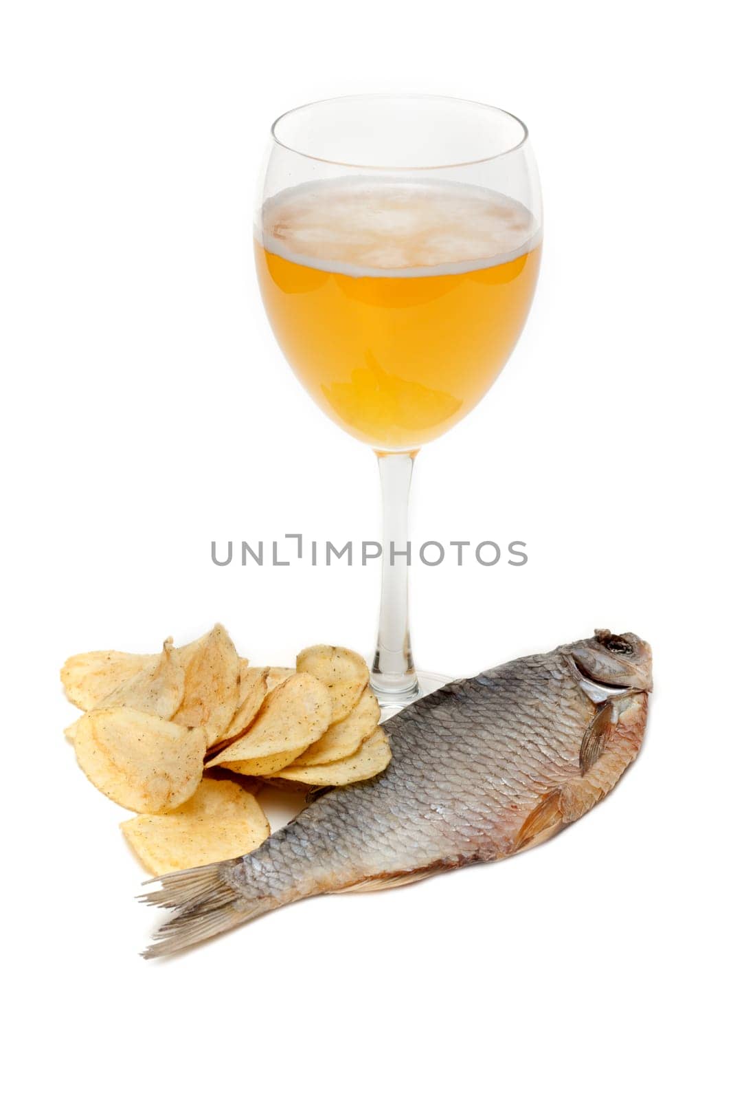 Goblet beer, dried fish and potato chips on white background