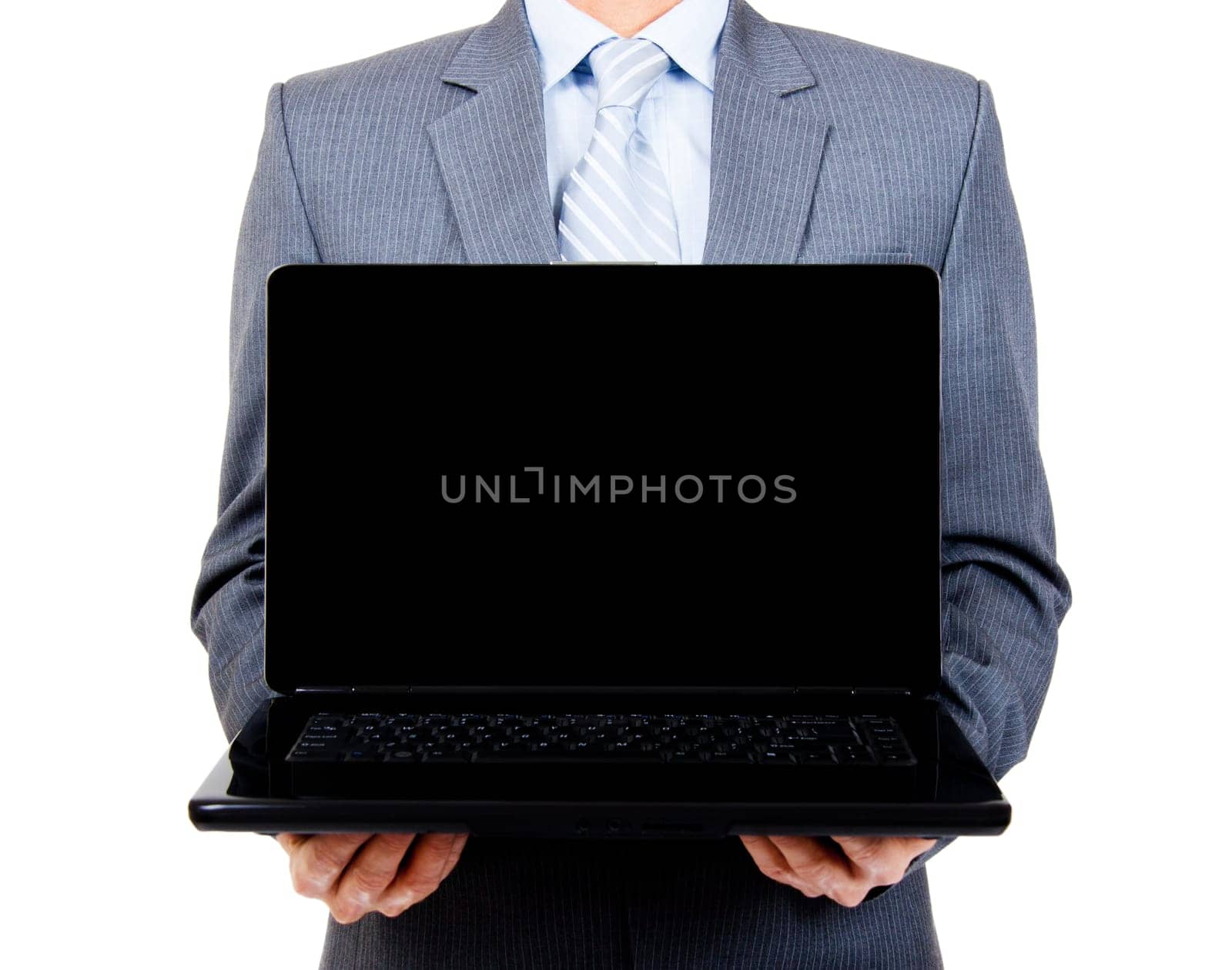 Business man holding a blank laptop for copy space on isolated backgroun