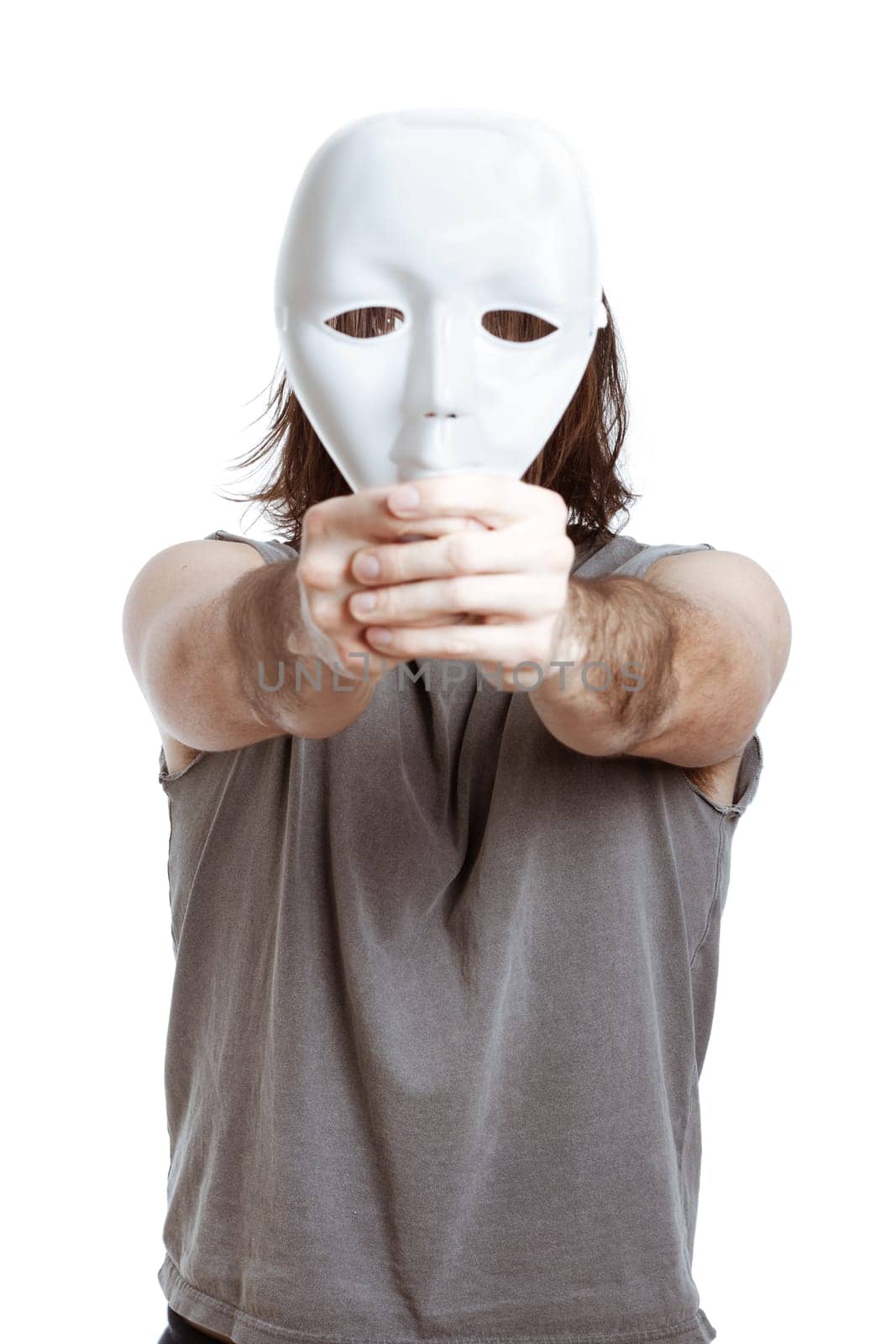 Bizarre man holding white mask, isolated on white background.