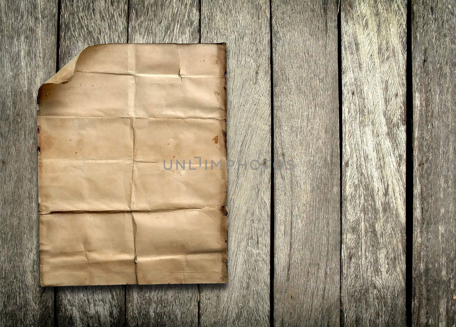 old paper on wood background