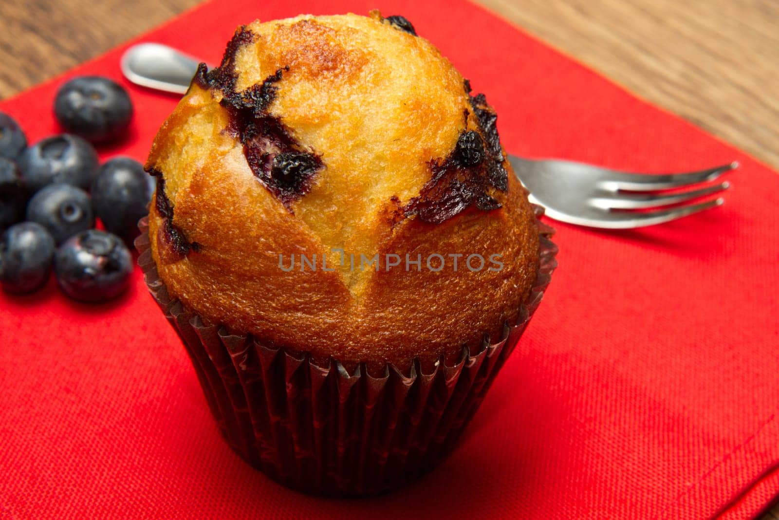 Home made chocolate chip muffin with blueberry
