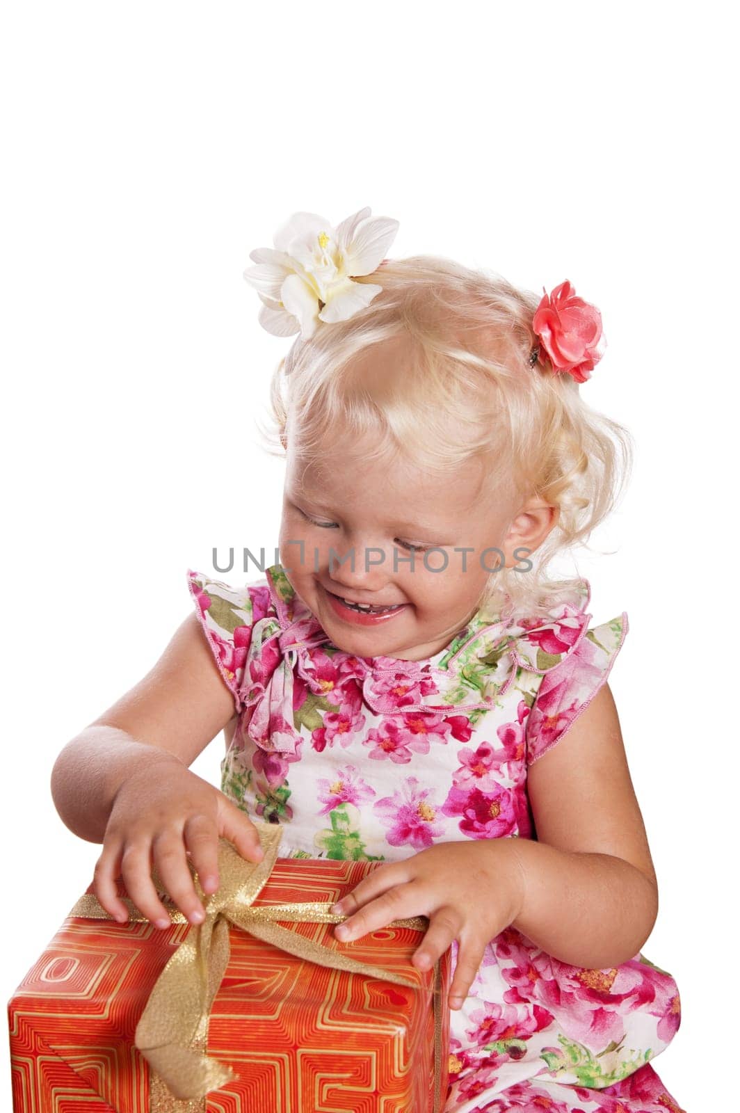 little girl opening gift box, isolated on white