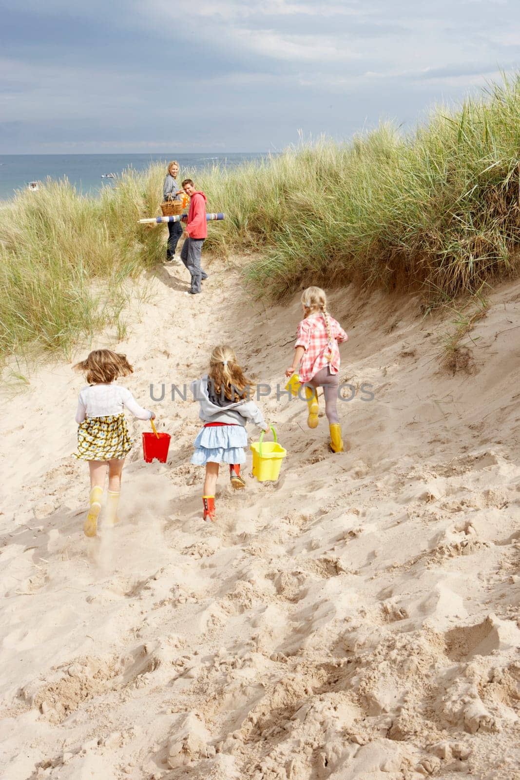 Family having fun on beach vacation