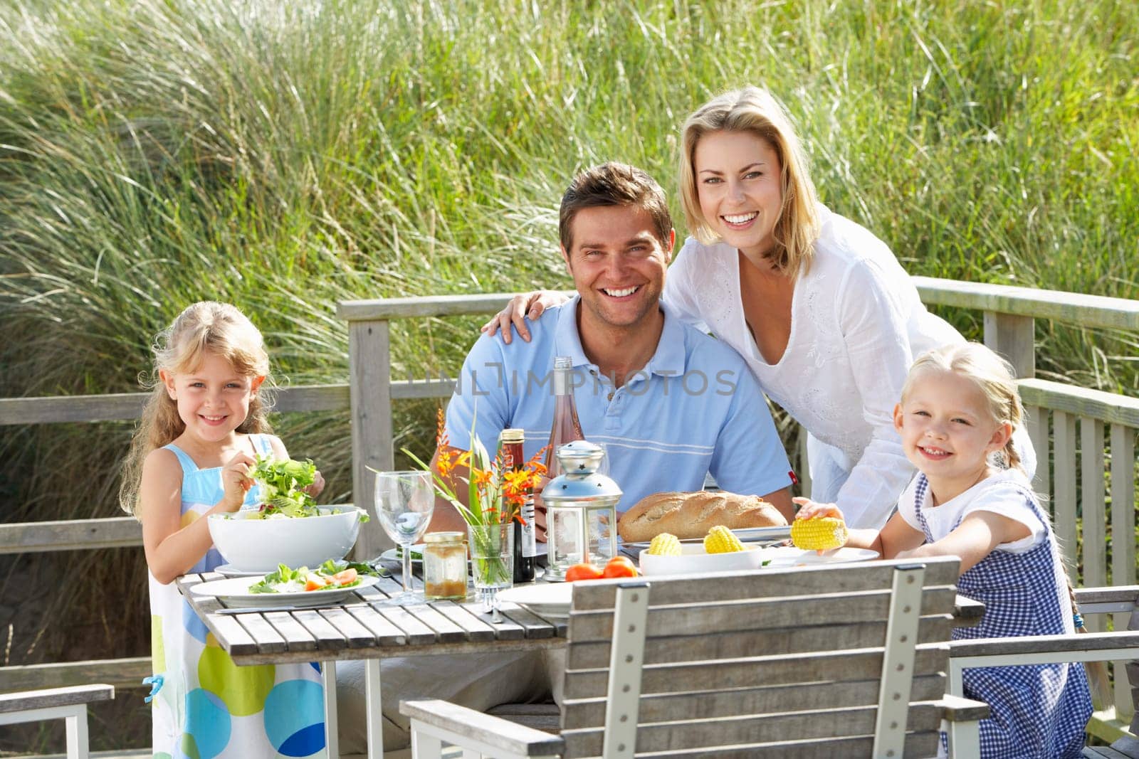 Family on vacation eating outdoors