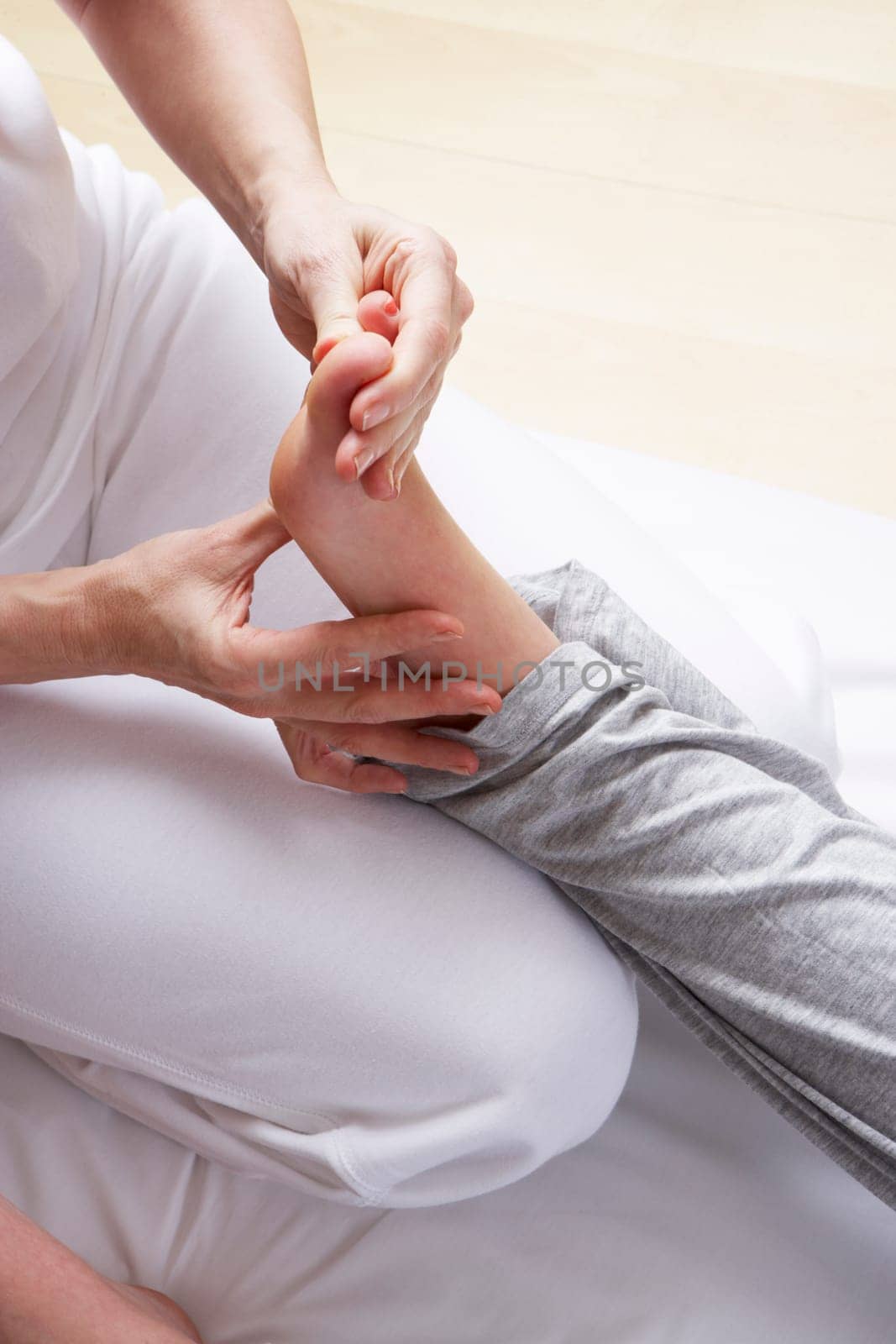 Detail foot reflexology massage