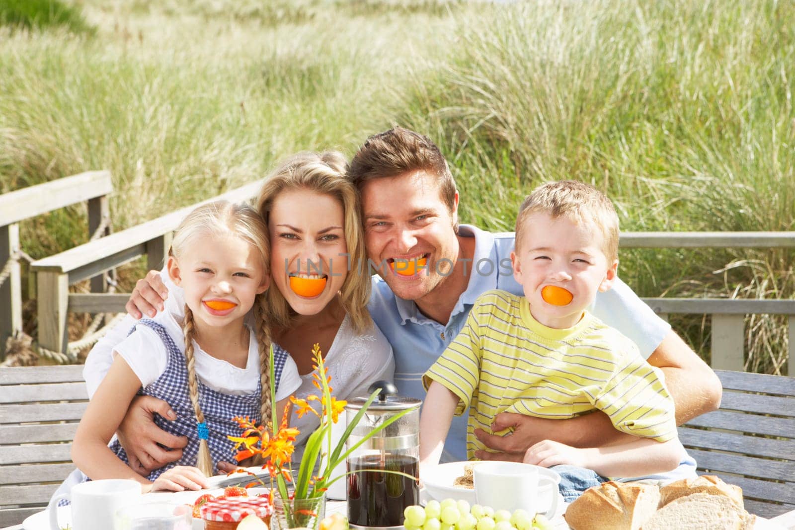 Family on vacation eating outdoors