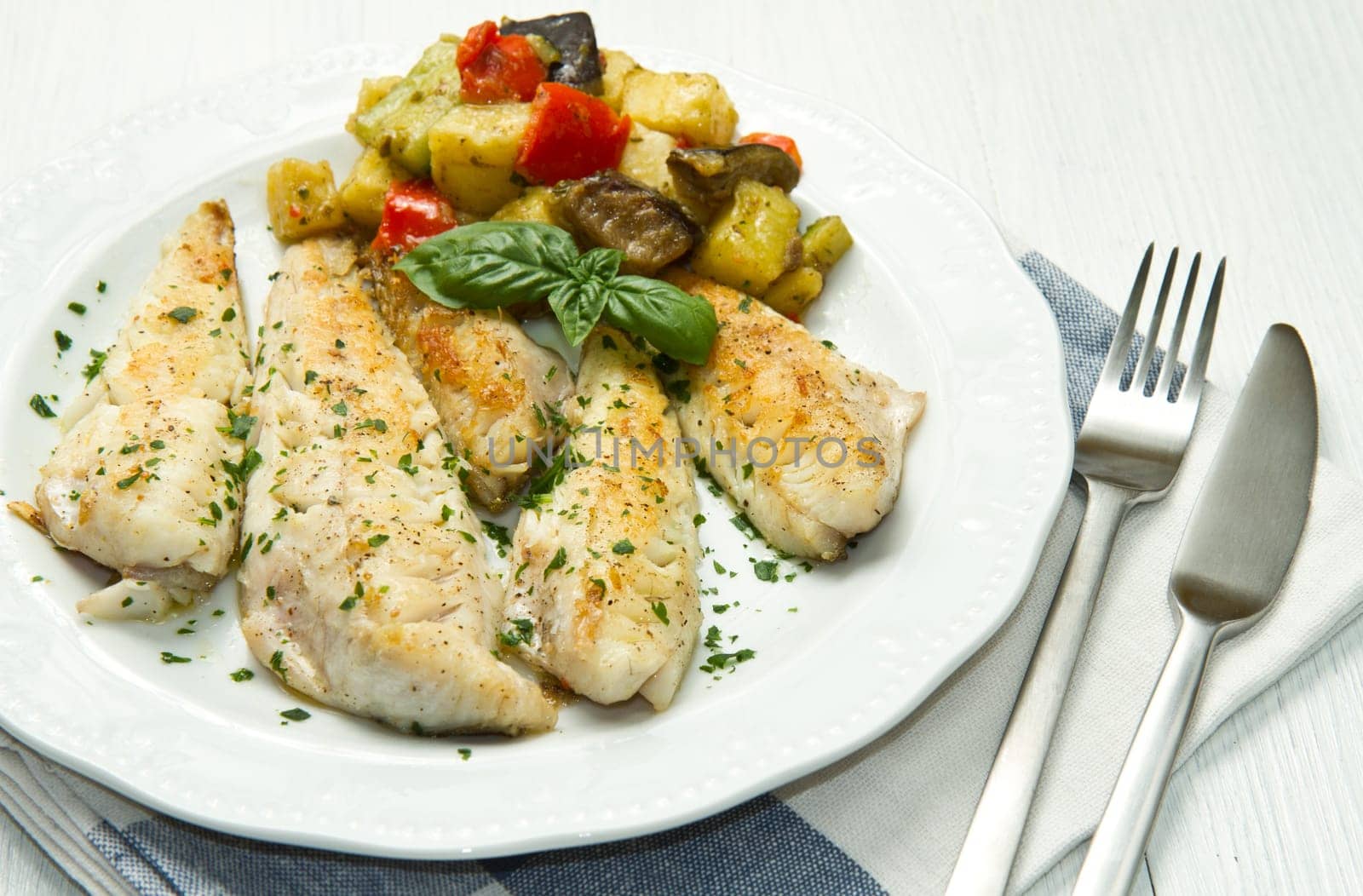Tasty healthy fish fillet with vegetables