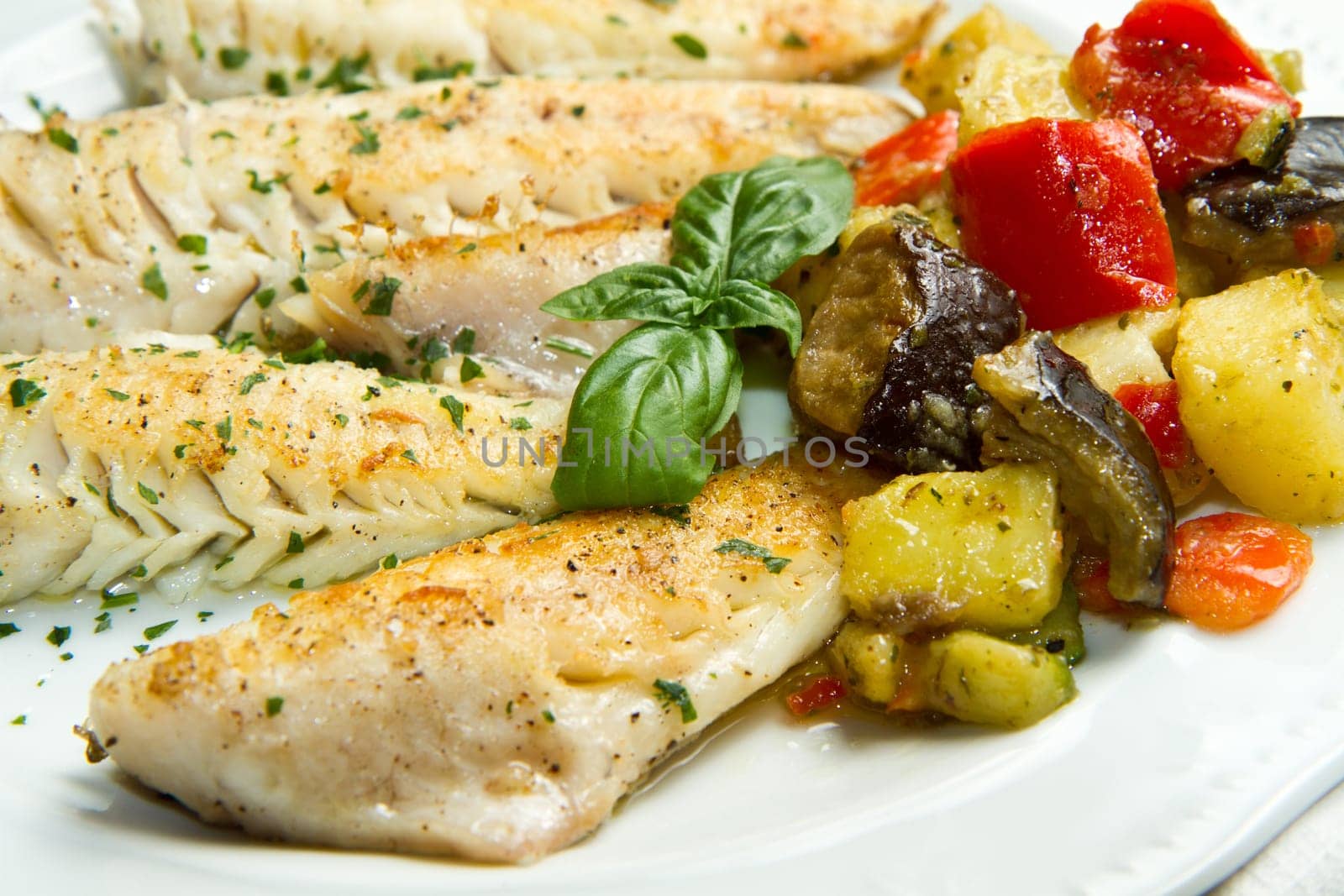 Tasty healthy fish fillet with vegetables
