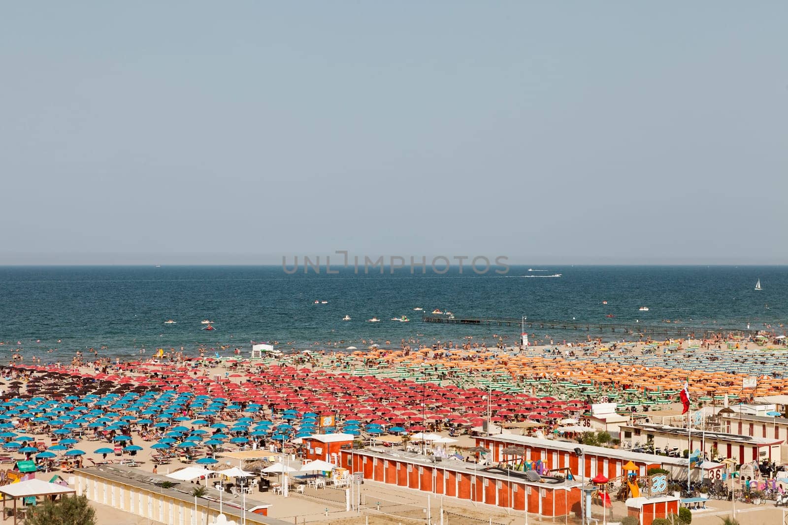 Large group of parasoles at the beach