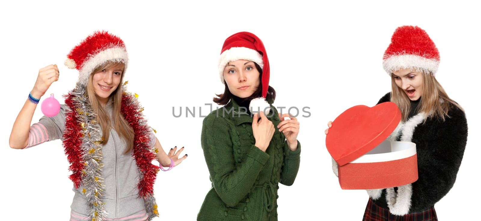 Three girls in cristmas hat with gift on white background
