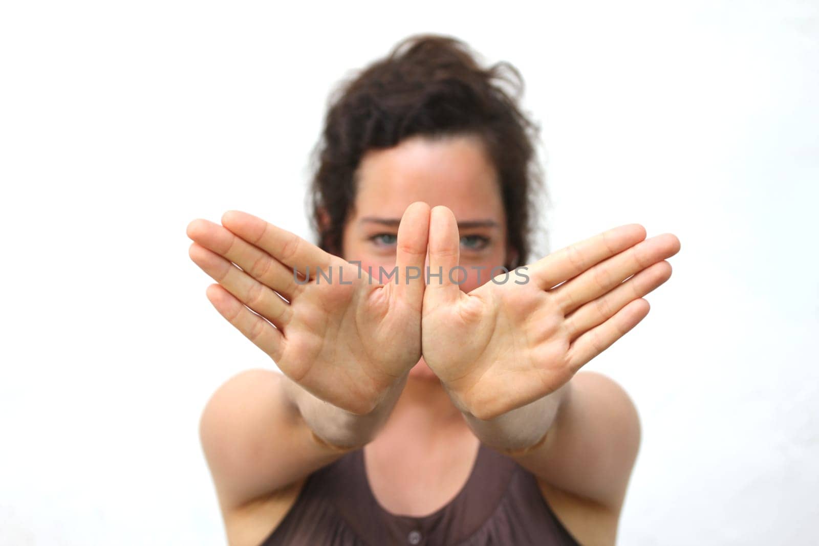young woman making a gesture with her hands