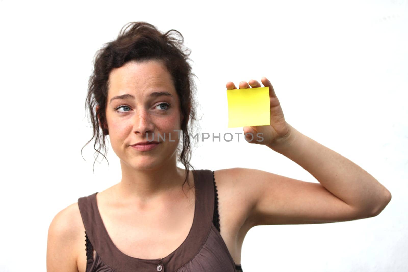 young woman with yellow note paper
