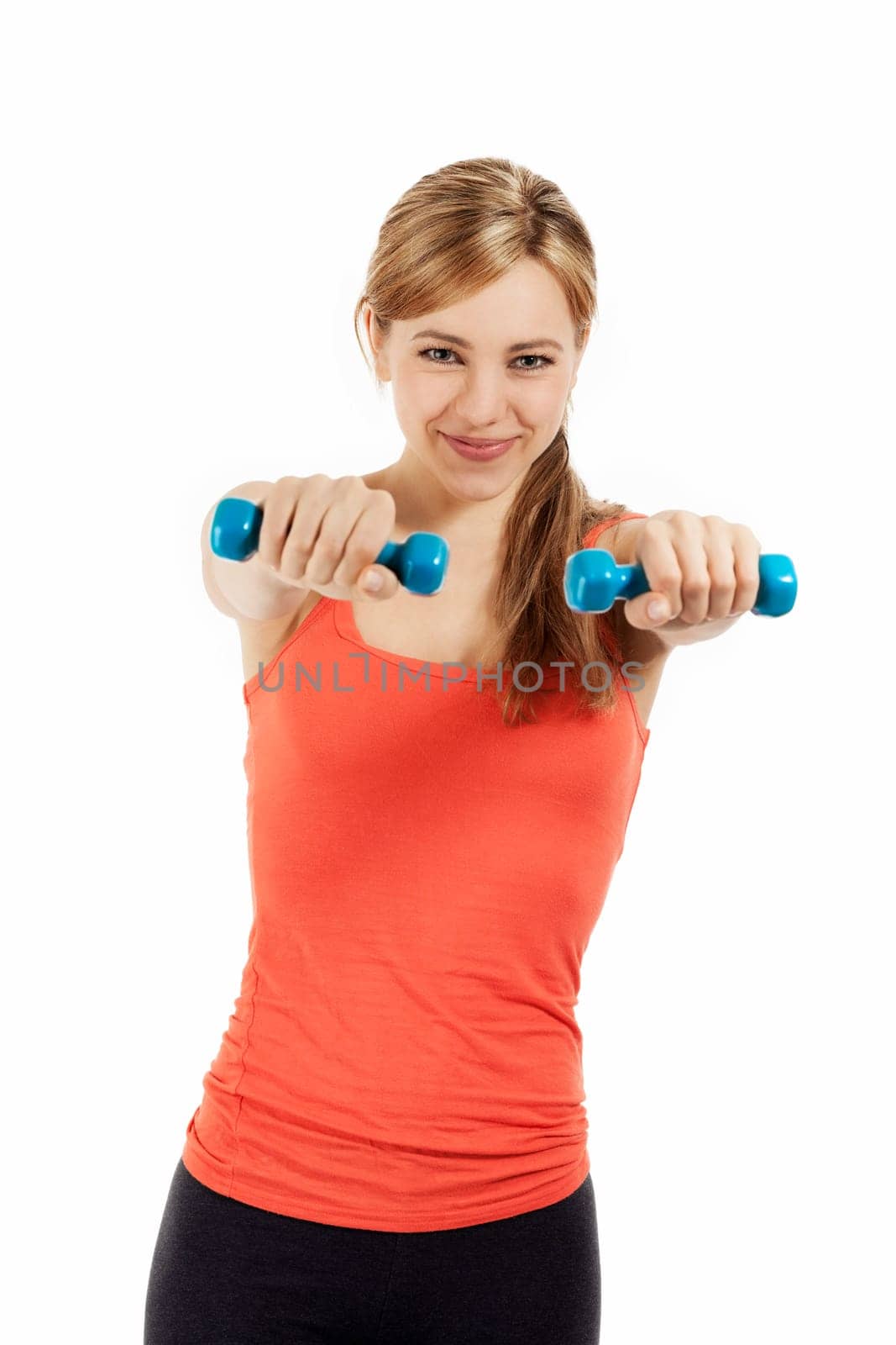 Pretty blonde sportswoman training with fitness dumbbells against white background