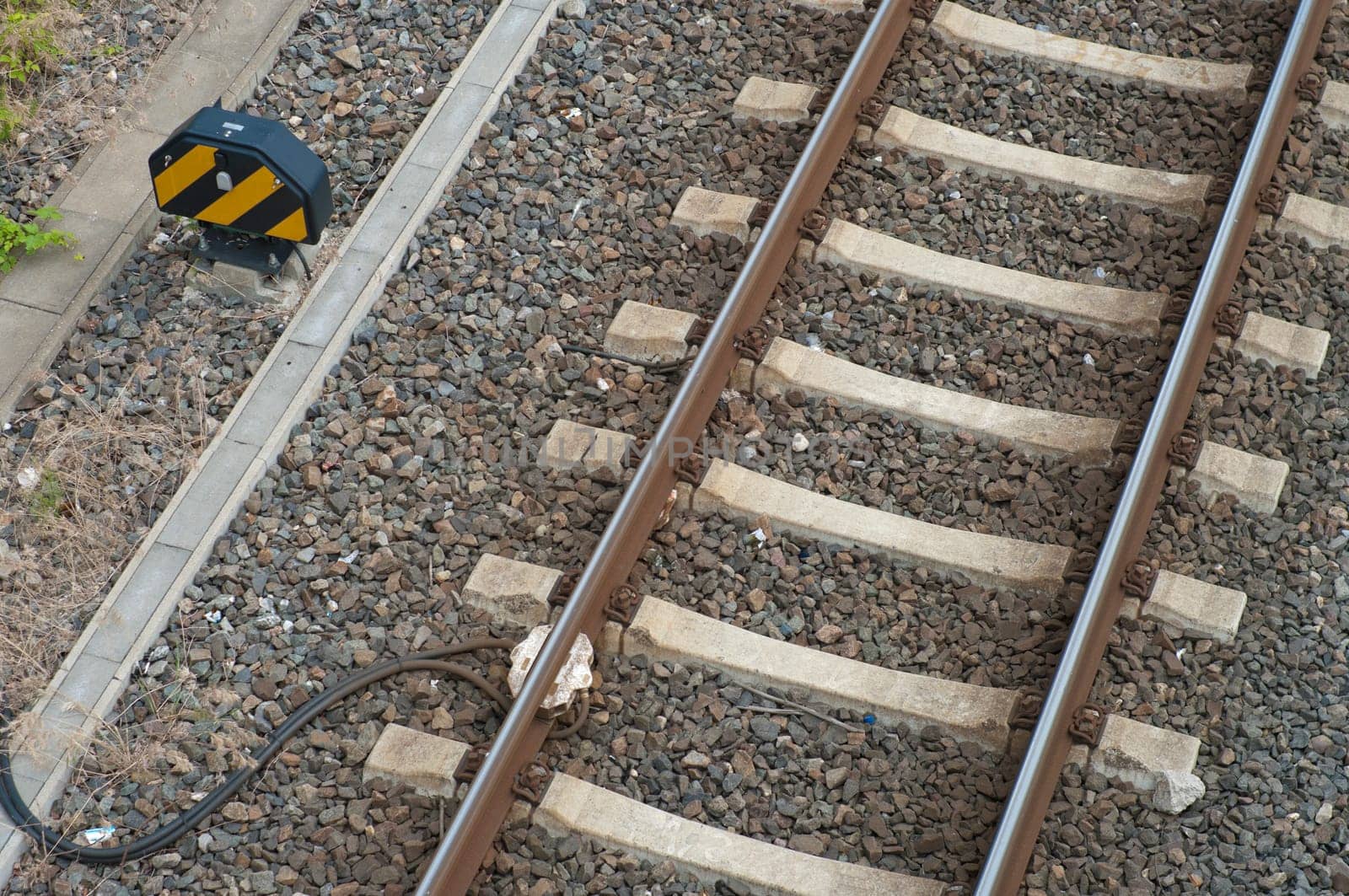 sensor at railway track for electronic control