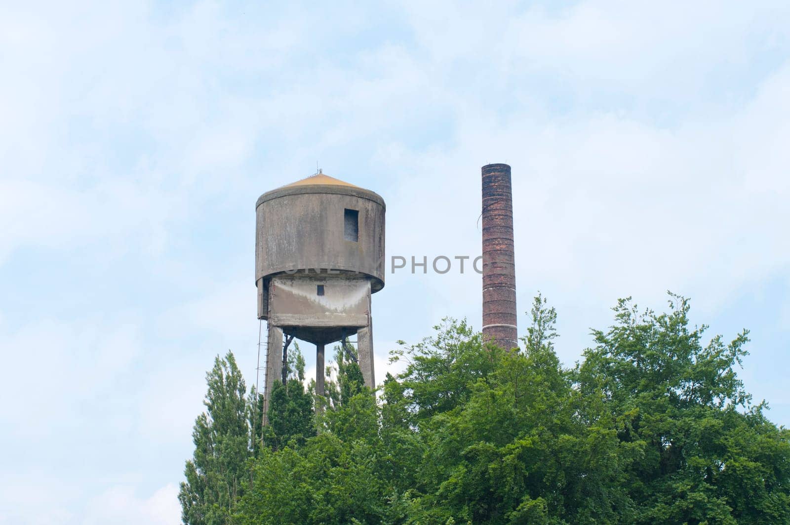old water tower and chimney in Gronau, Germany