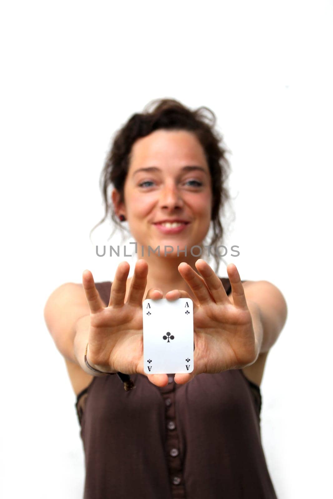 young woman holding a ace playing card