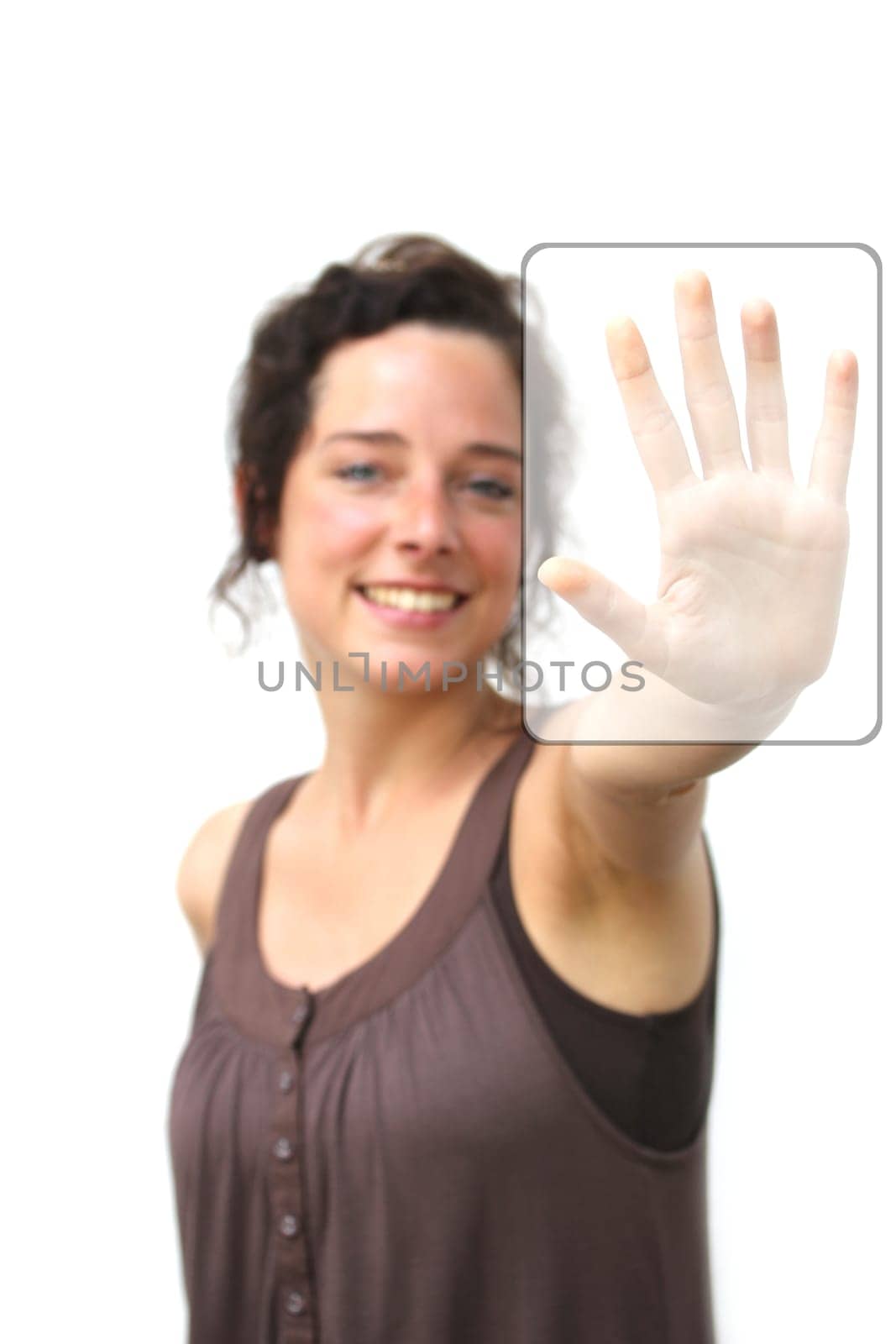 young woman pointing at a digital interface with her left hand