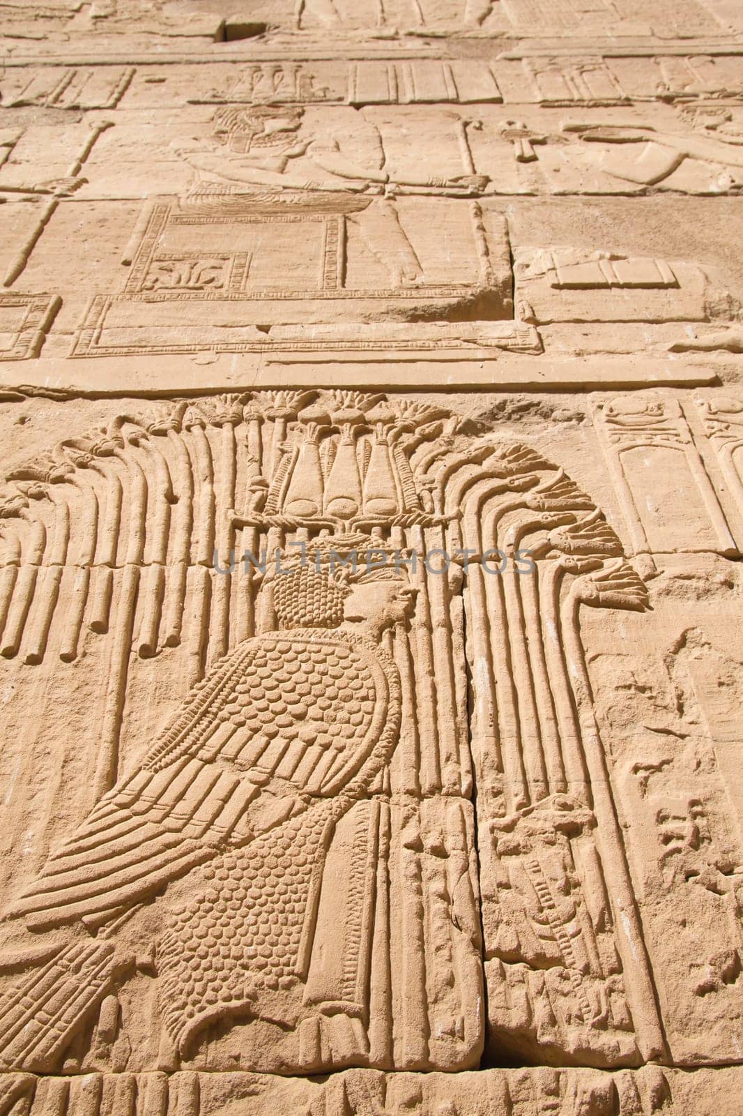 Carving of Egyptian god on pylon in Temple of Kalabsha, near Aswan (Nubia, Egypt)
