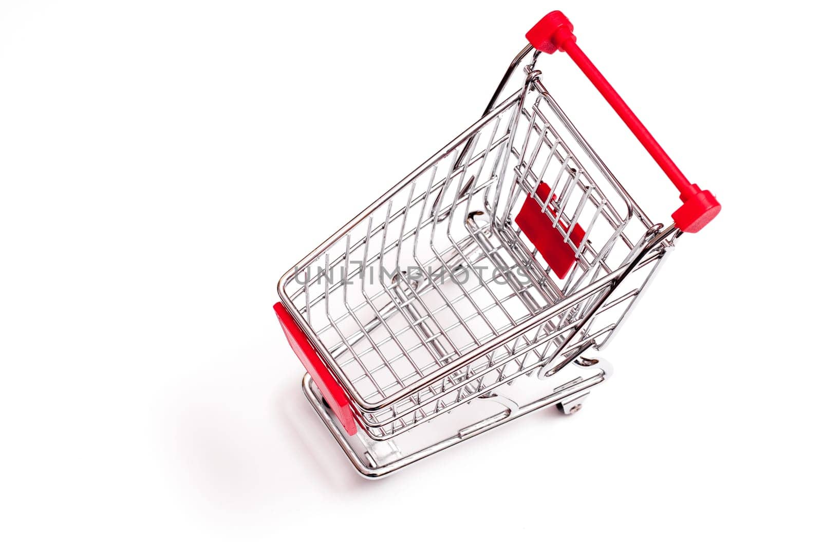 Shopping cart from above against a white background