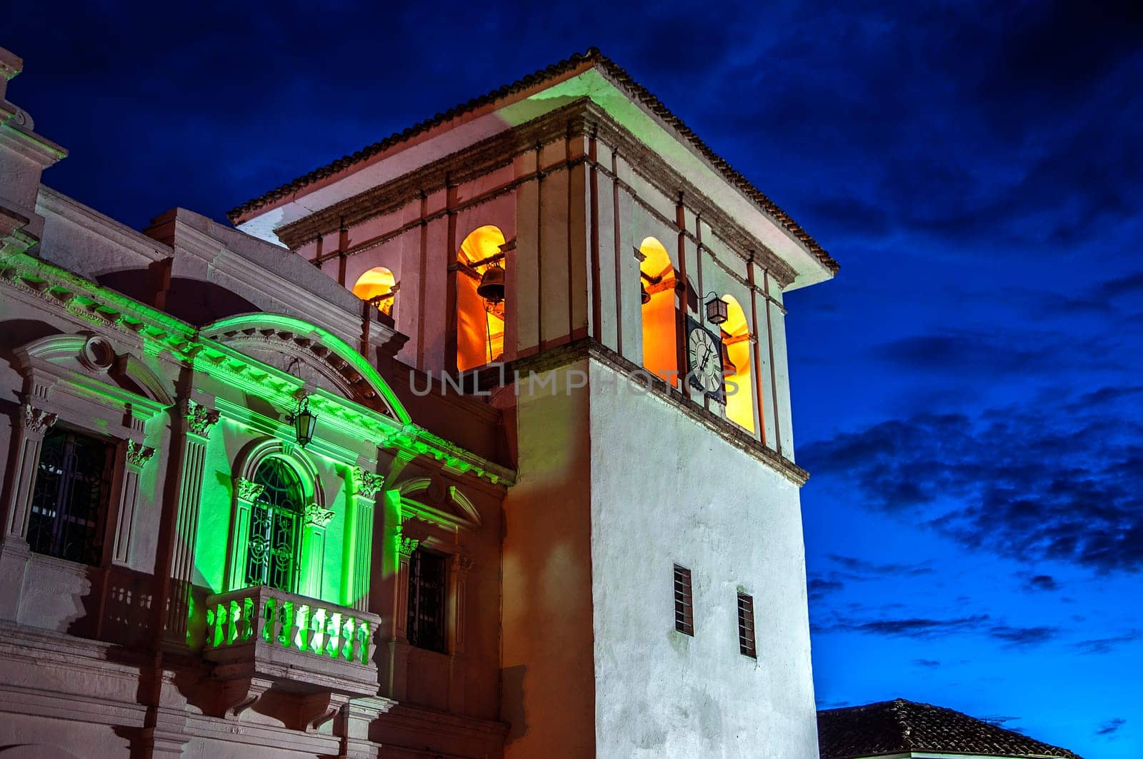 The clock tower in Popayan, Colombia during the blue hour.