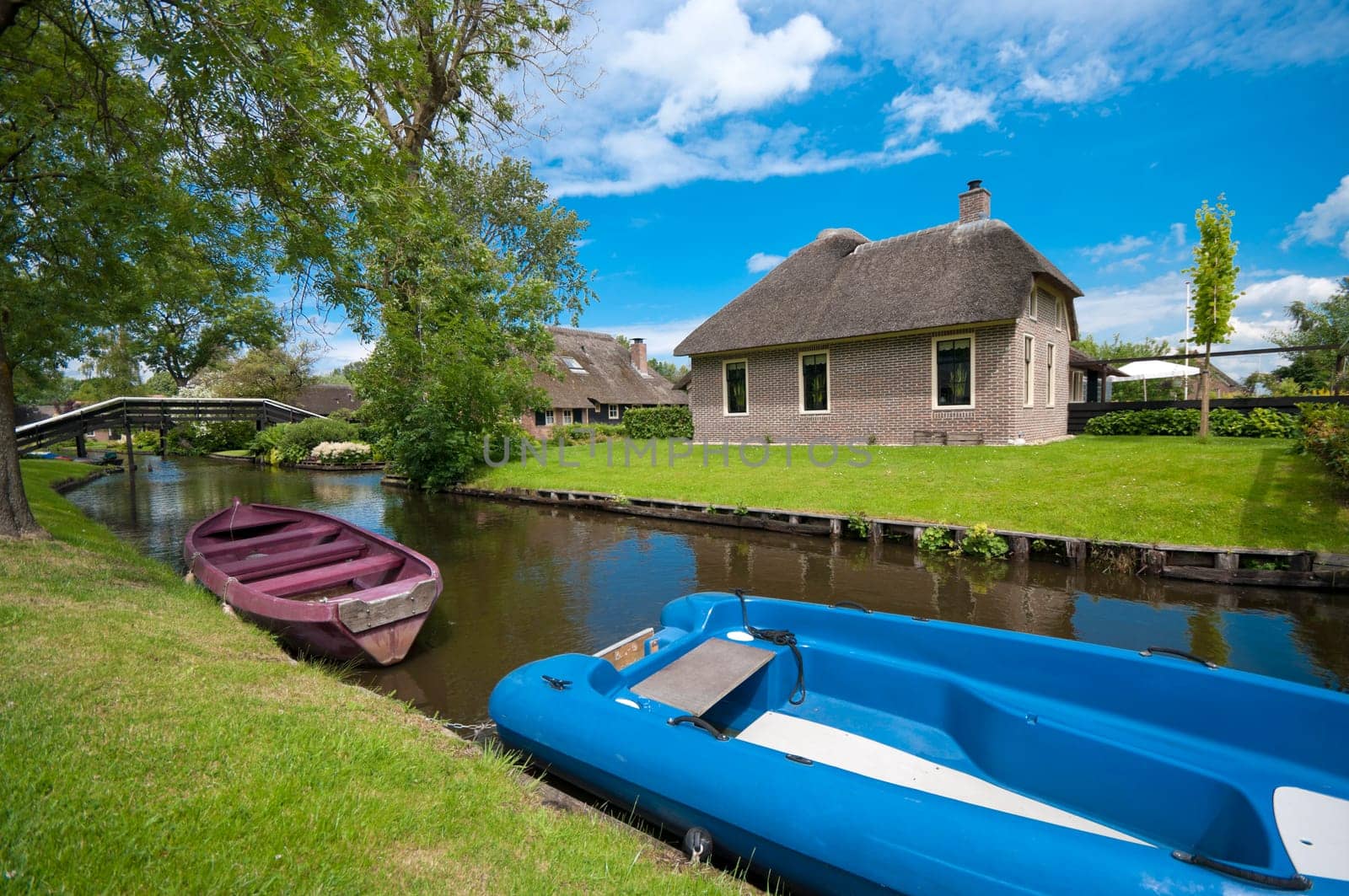 the idyllic Village of Giethoorn, also knows as Venice of the Netherlands, with its typical houses, bridges and canals