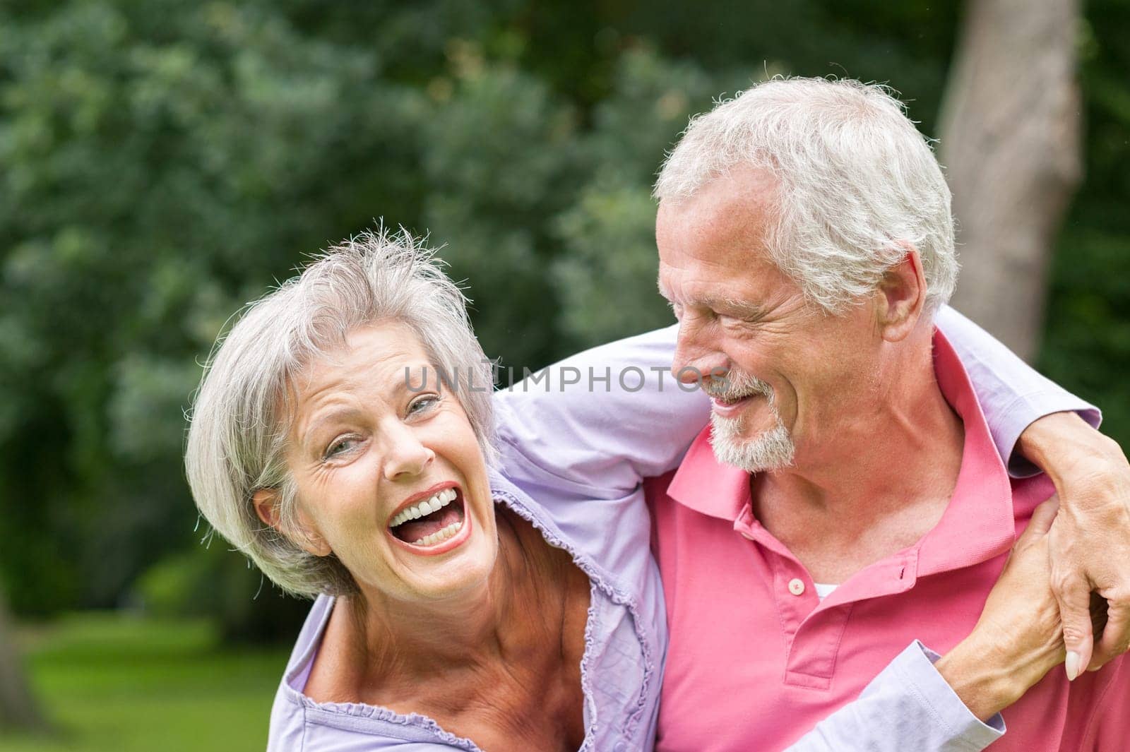 Happy senior couple in a park