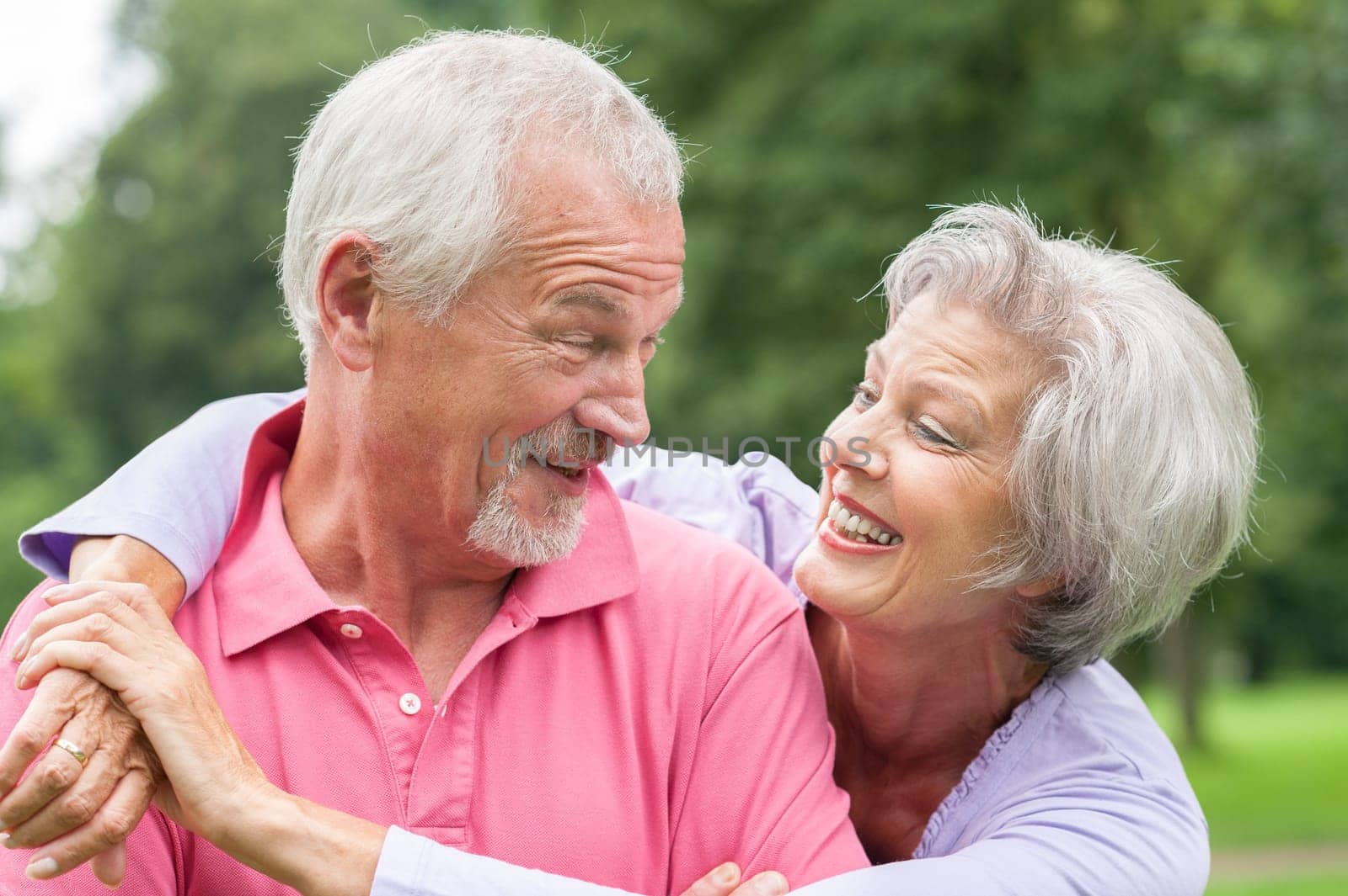Happy senior couple in a park
