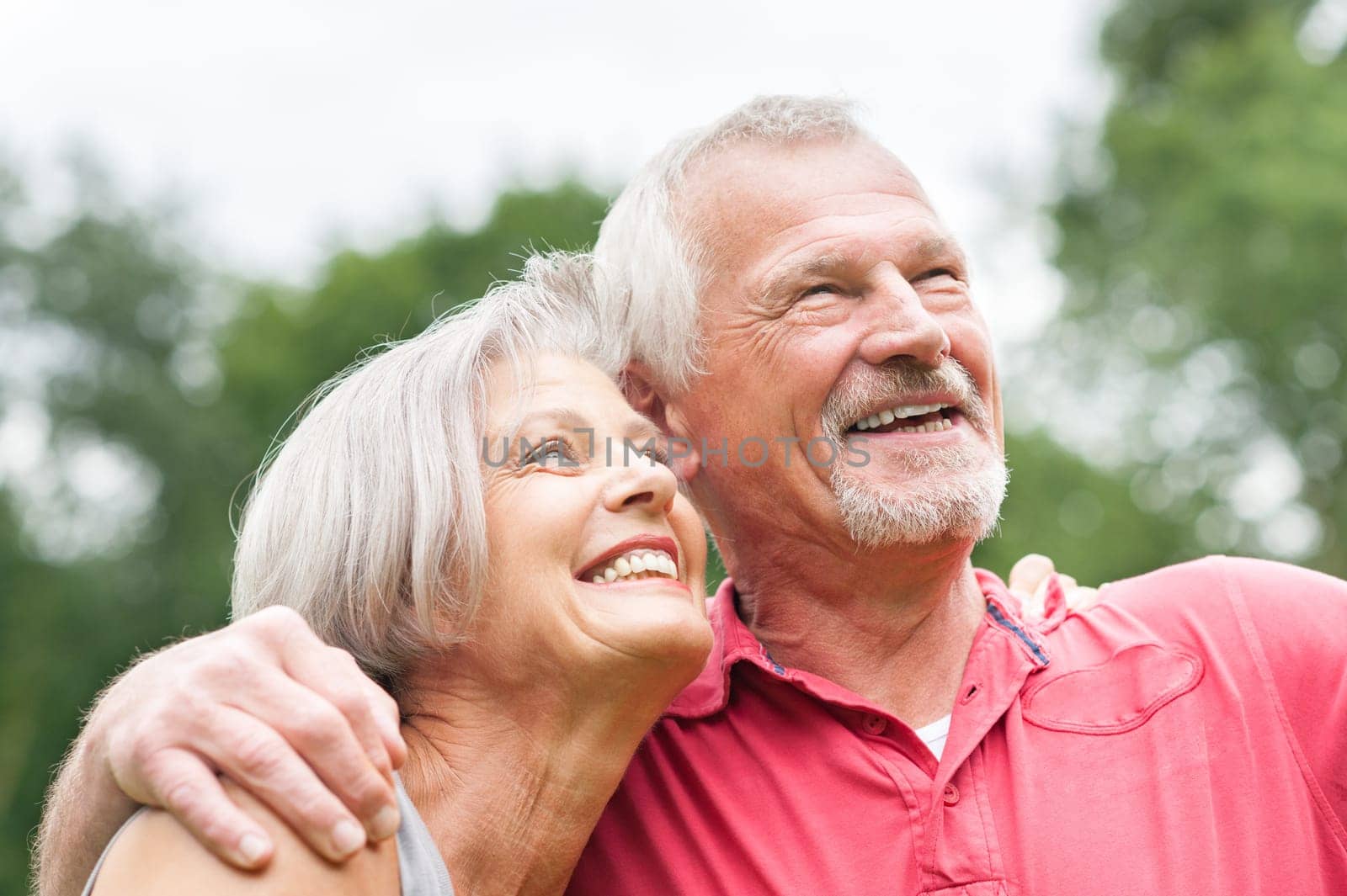Happy senior couple in a park