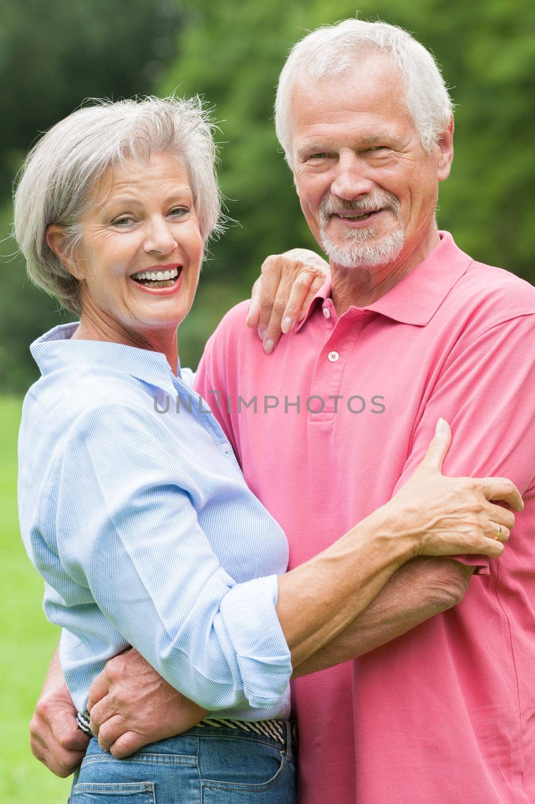 Happy senior couple in a park