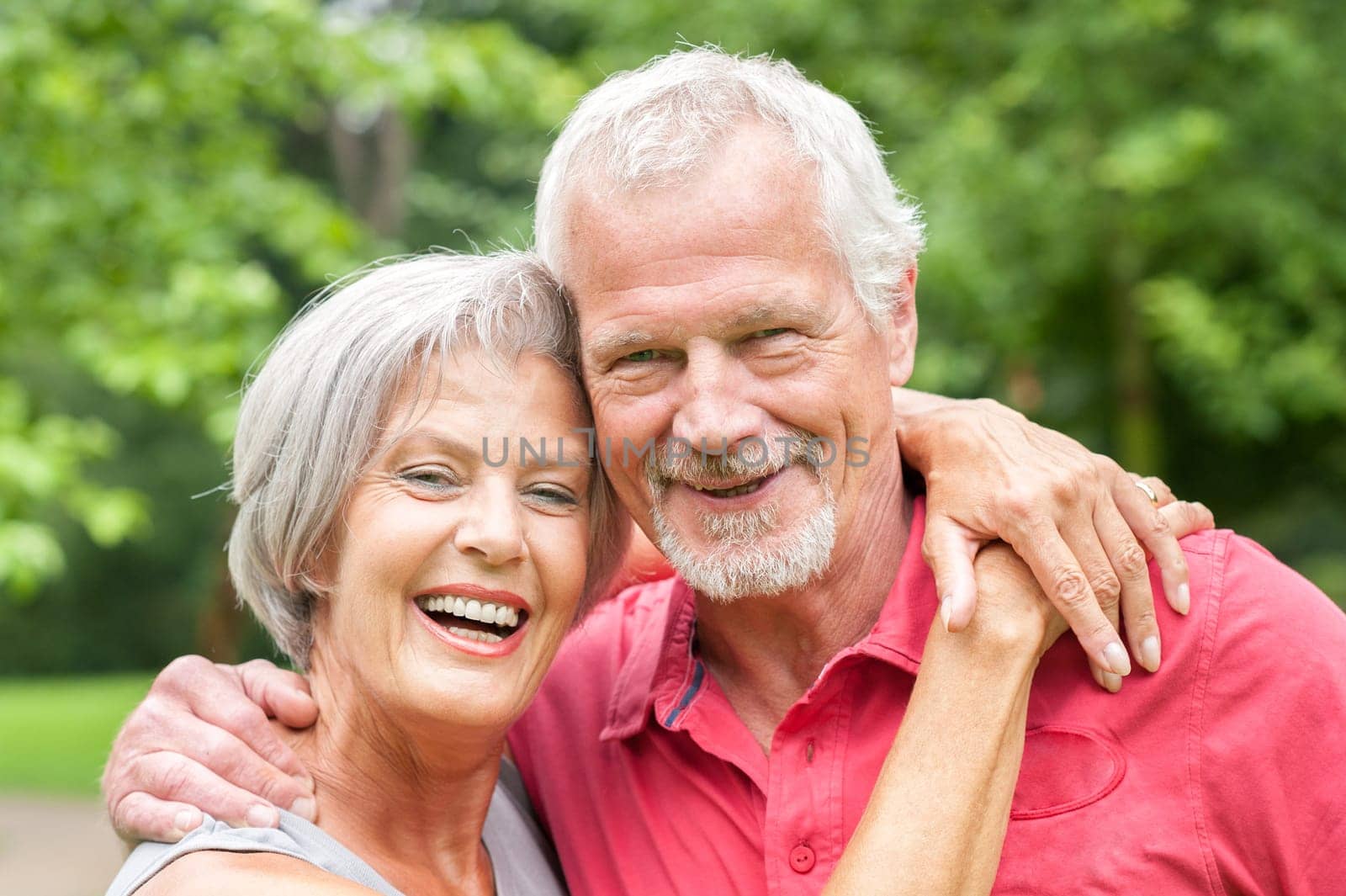 Happy senior couple in a park