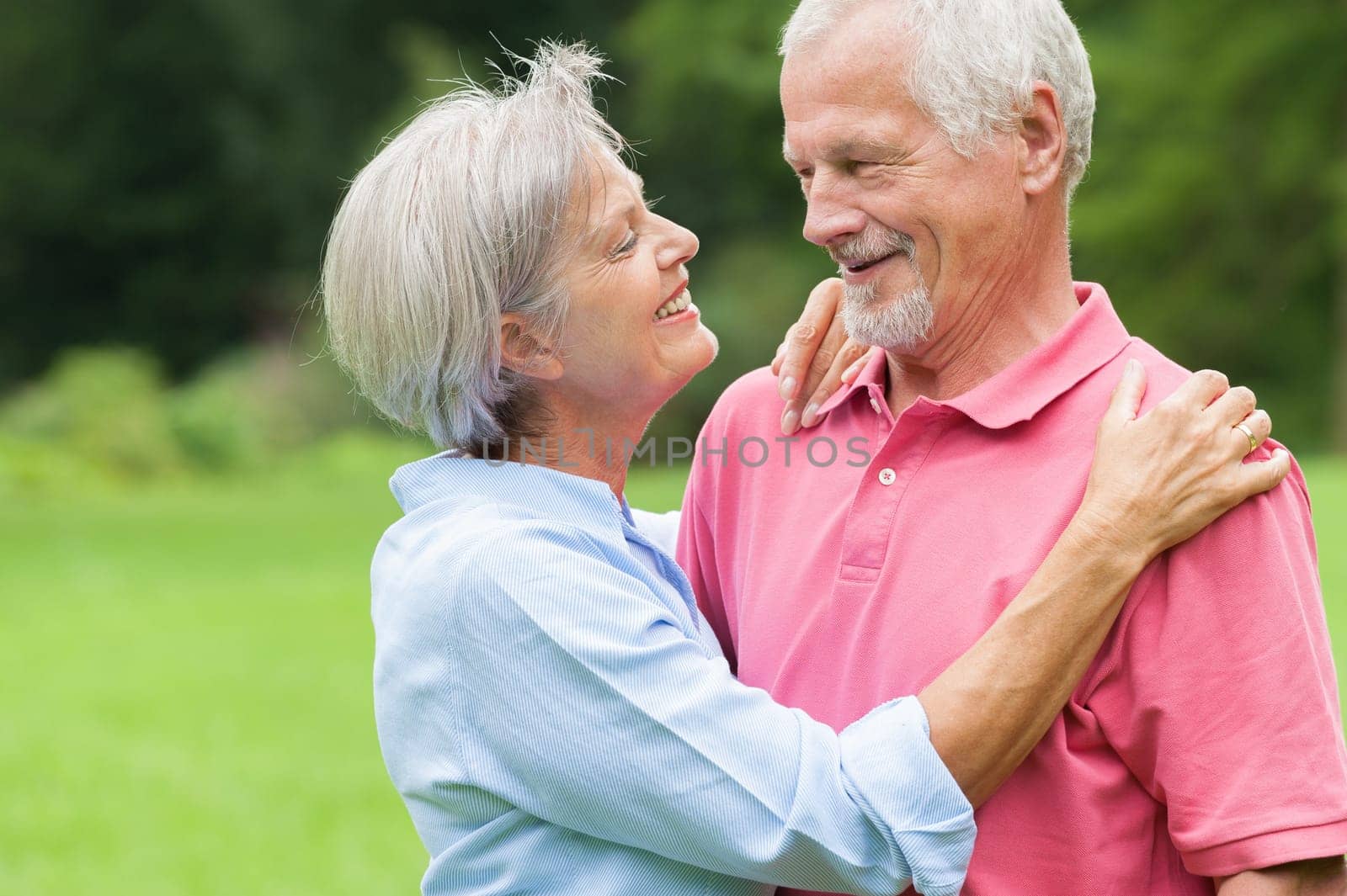 Happy senior couple in a park