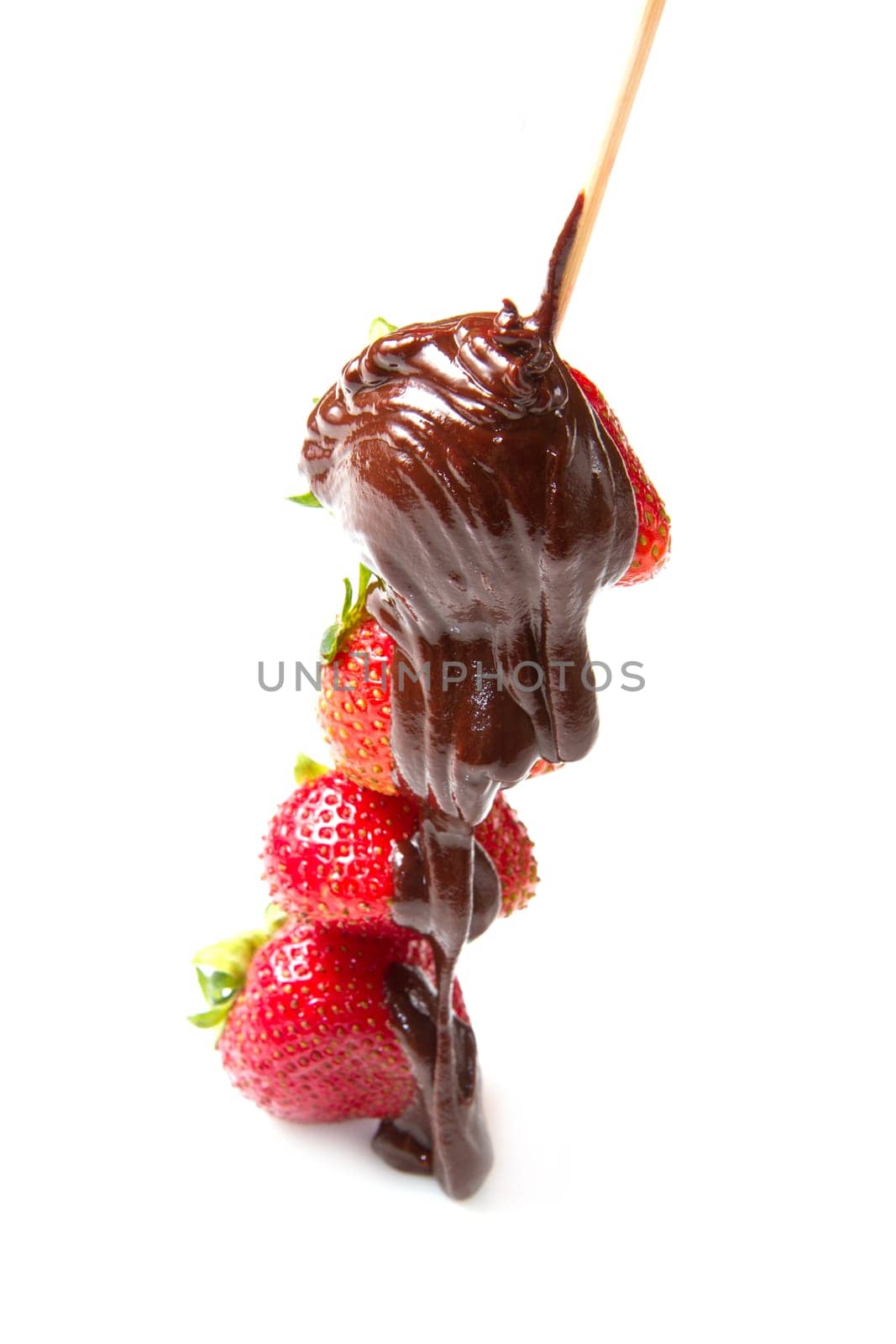 strawberries and chocolate on a white background