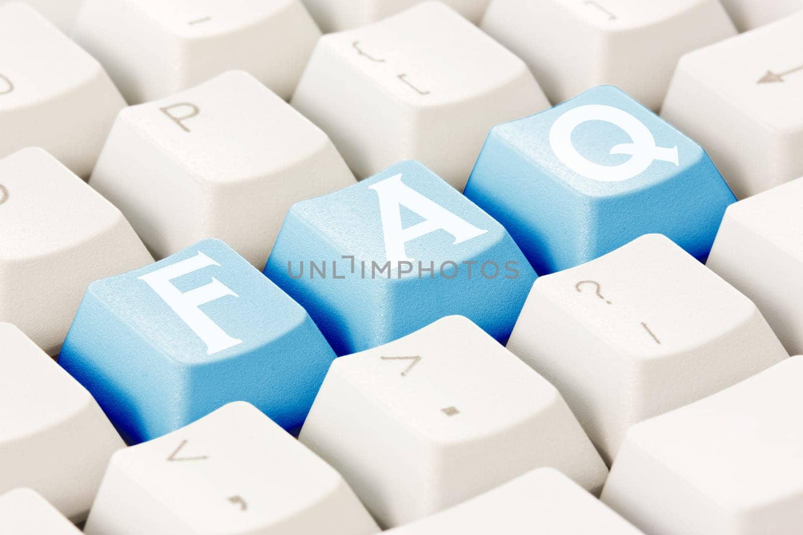 Computer keyboard with a FAQ text on the keys