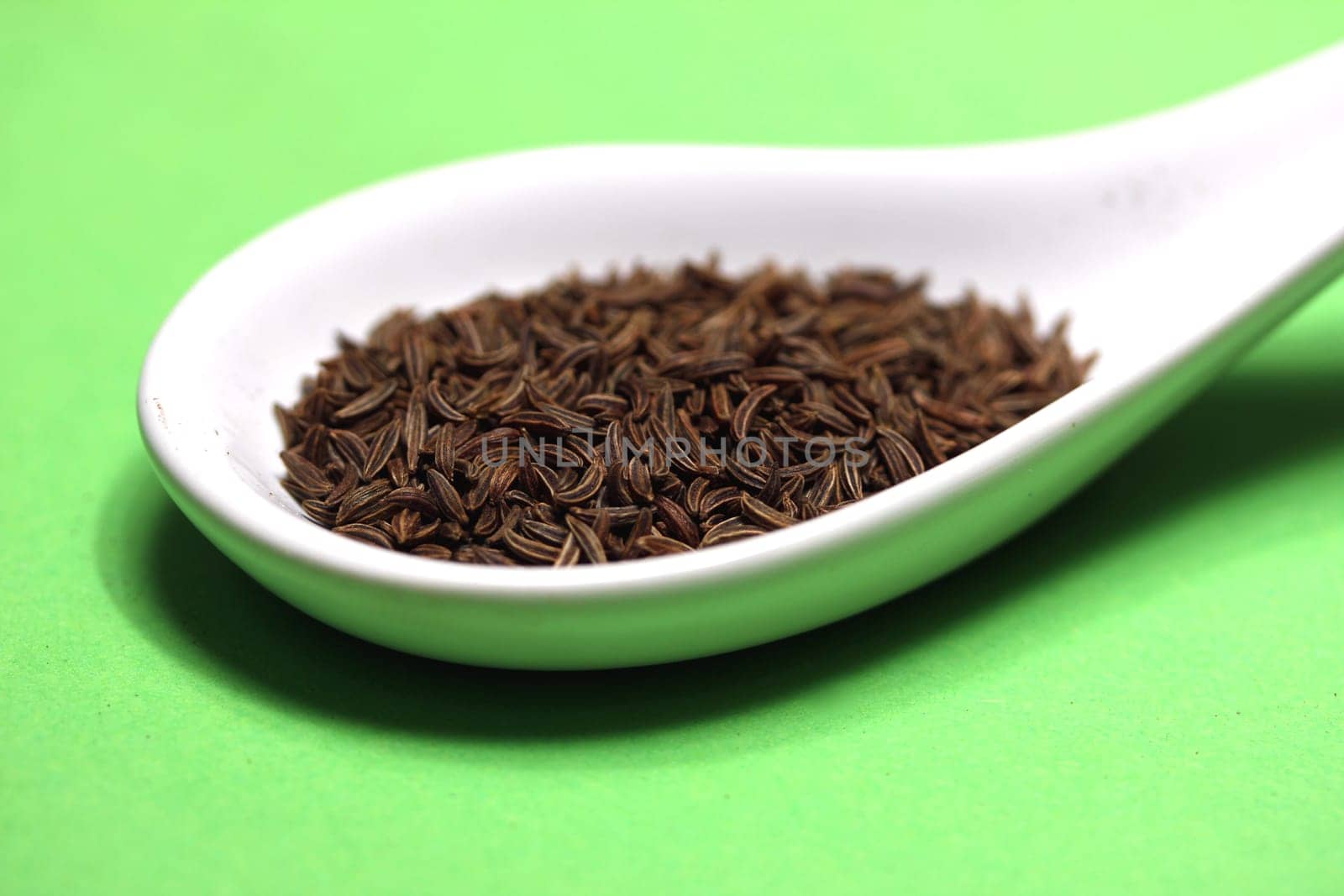 caraway on a porcelain spoon