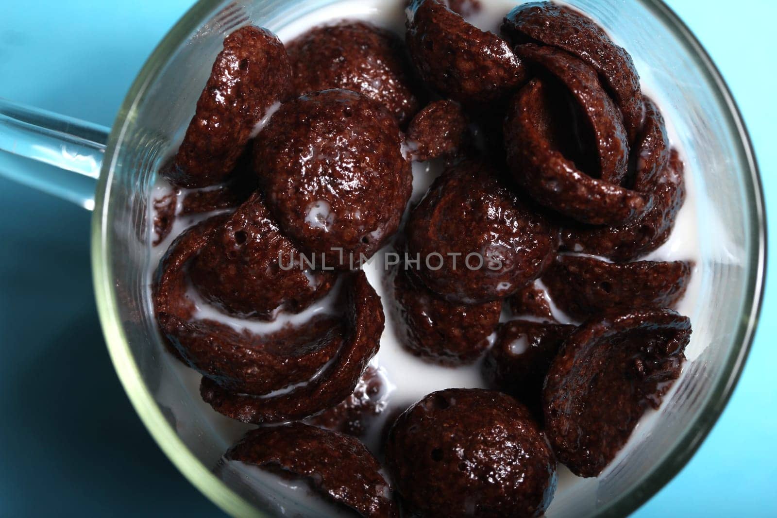 chocolate flakes with milk in glass