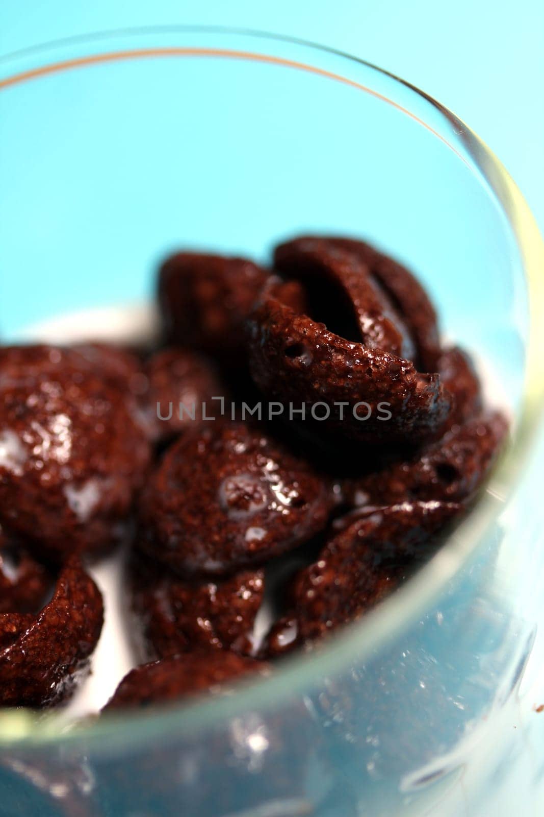 chocolate flakes with milk in glass
