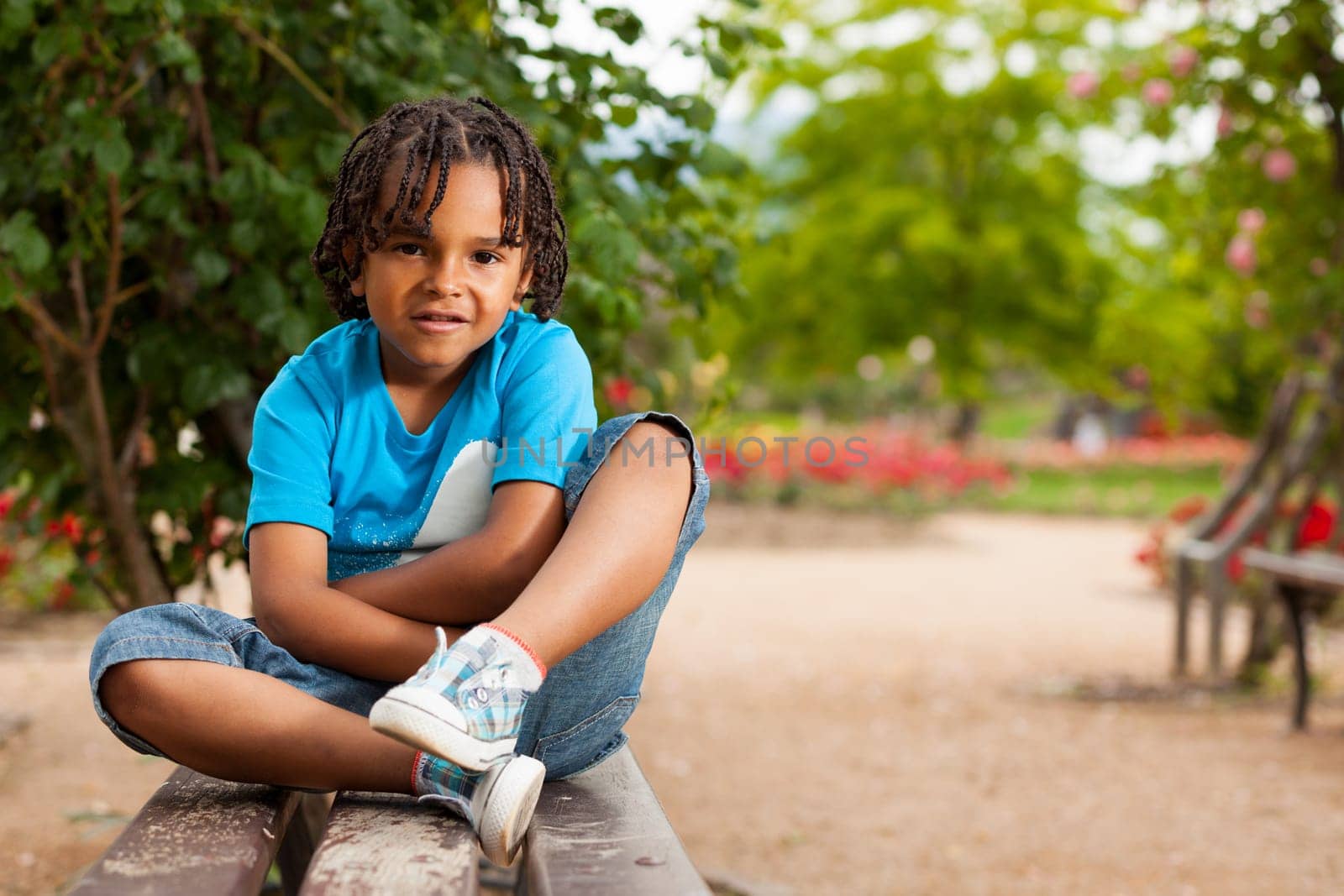 Outdoor portrait of a cute african american little boy