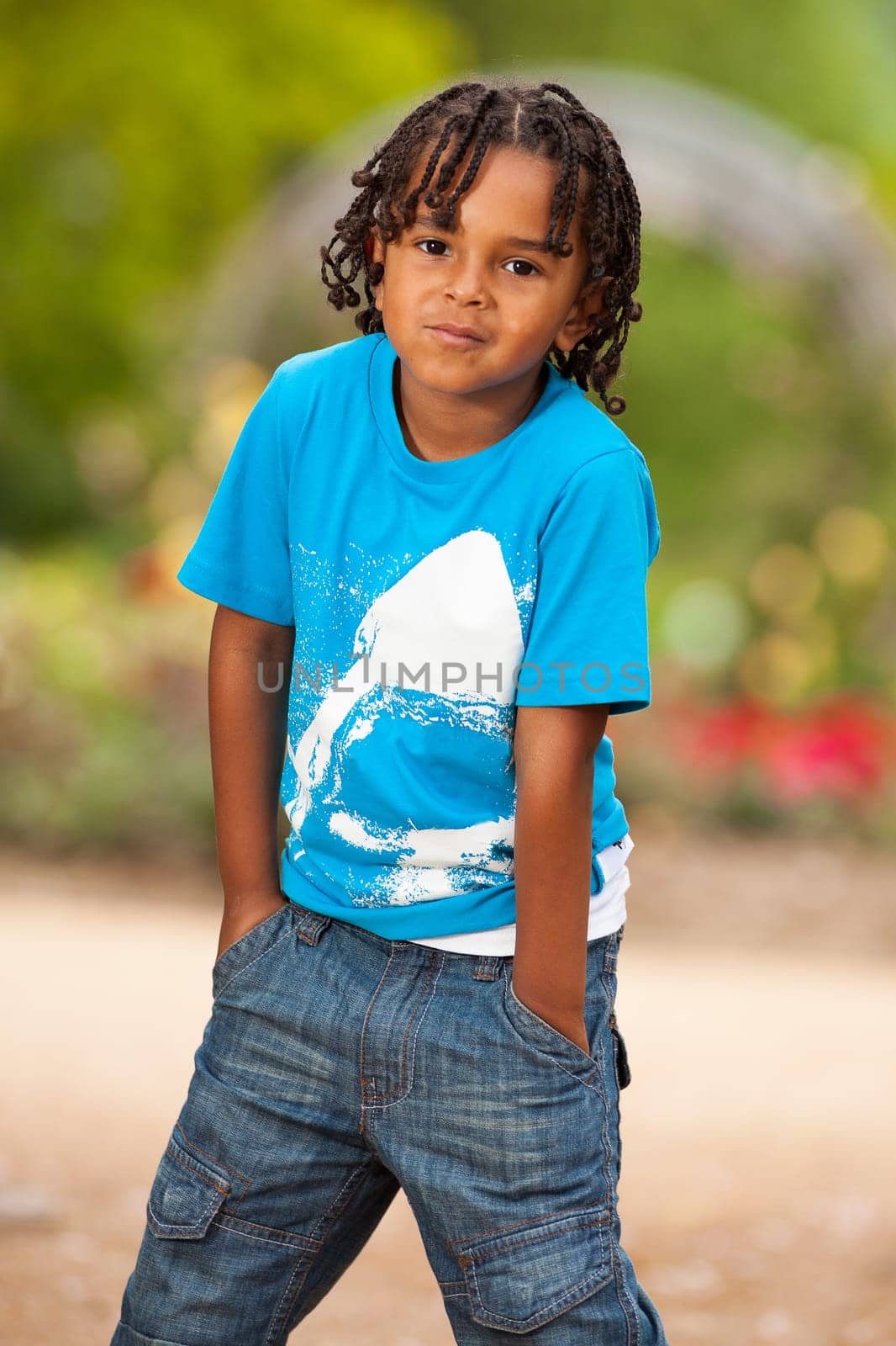 Outdoor portrait of a cute african american little boy