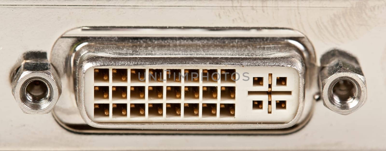 old beige monitor jack on a steel plate