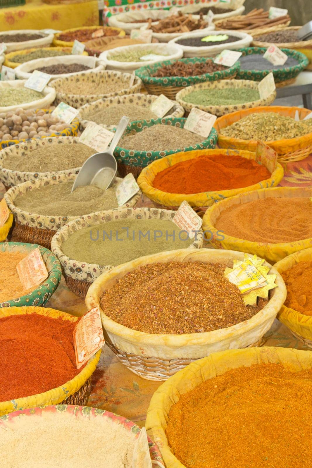 Various kinds of spices prepared to sell at a farmer&#039 s market.Vertically. (Provence, France)