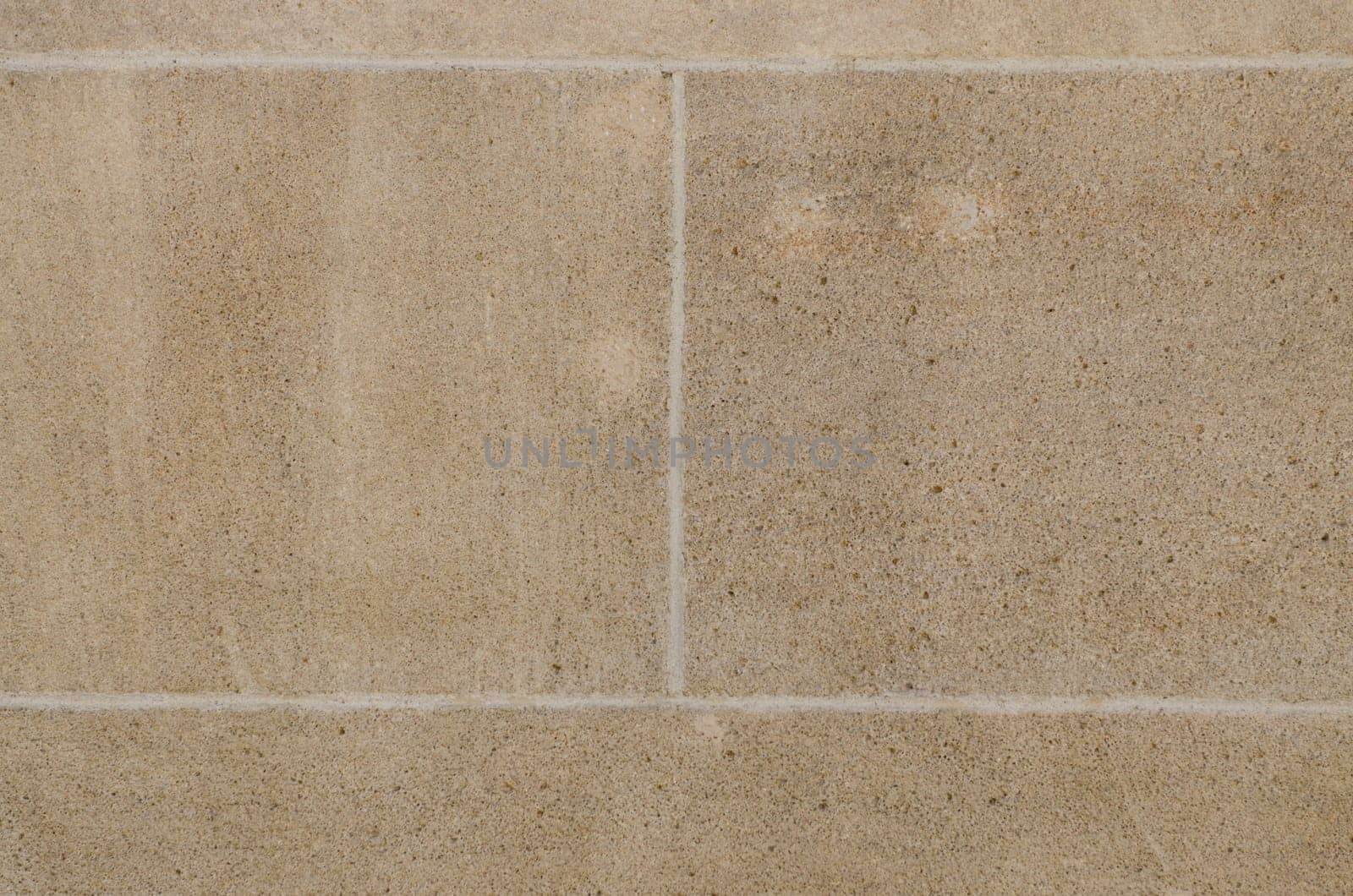Brown sandstone wall with joints
