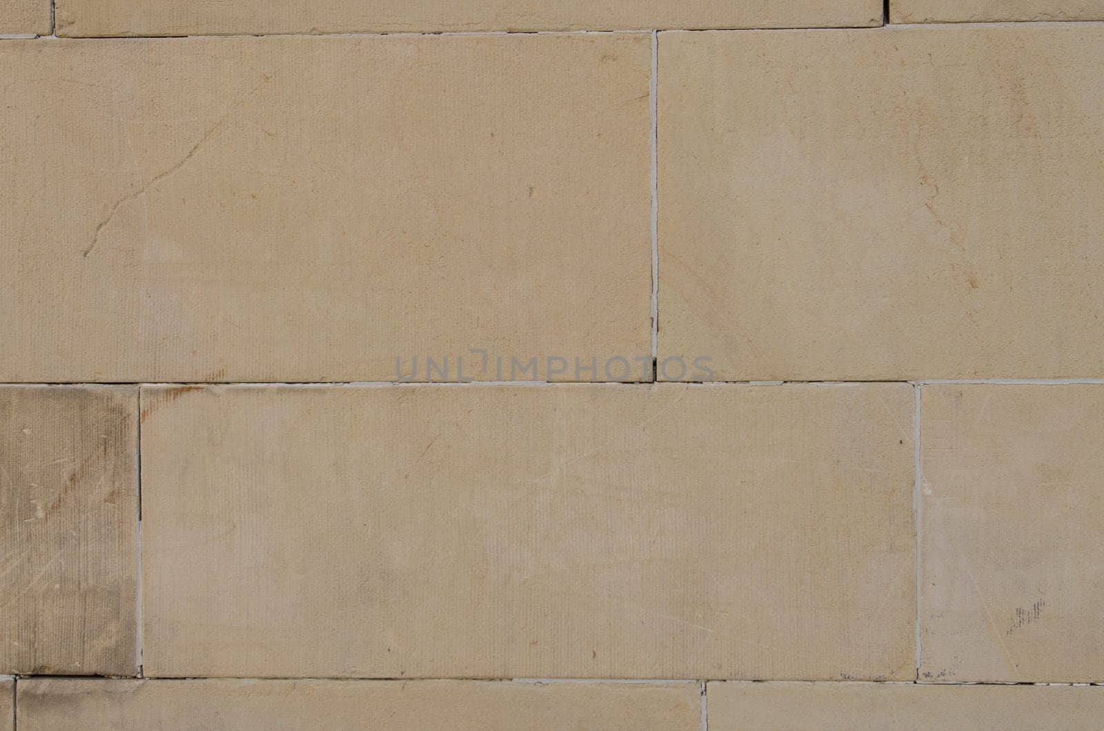 Stone wall made of sandstone and several ashlars