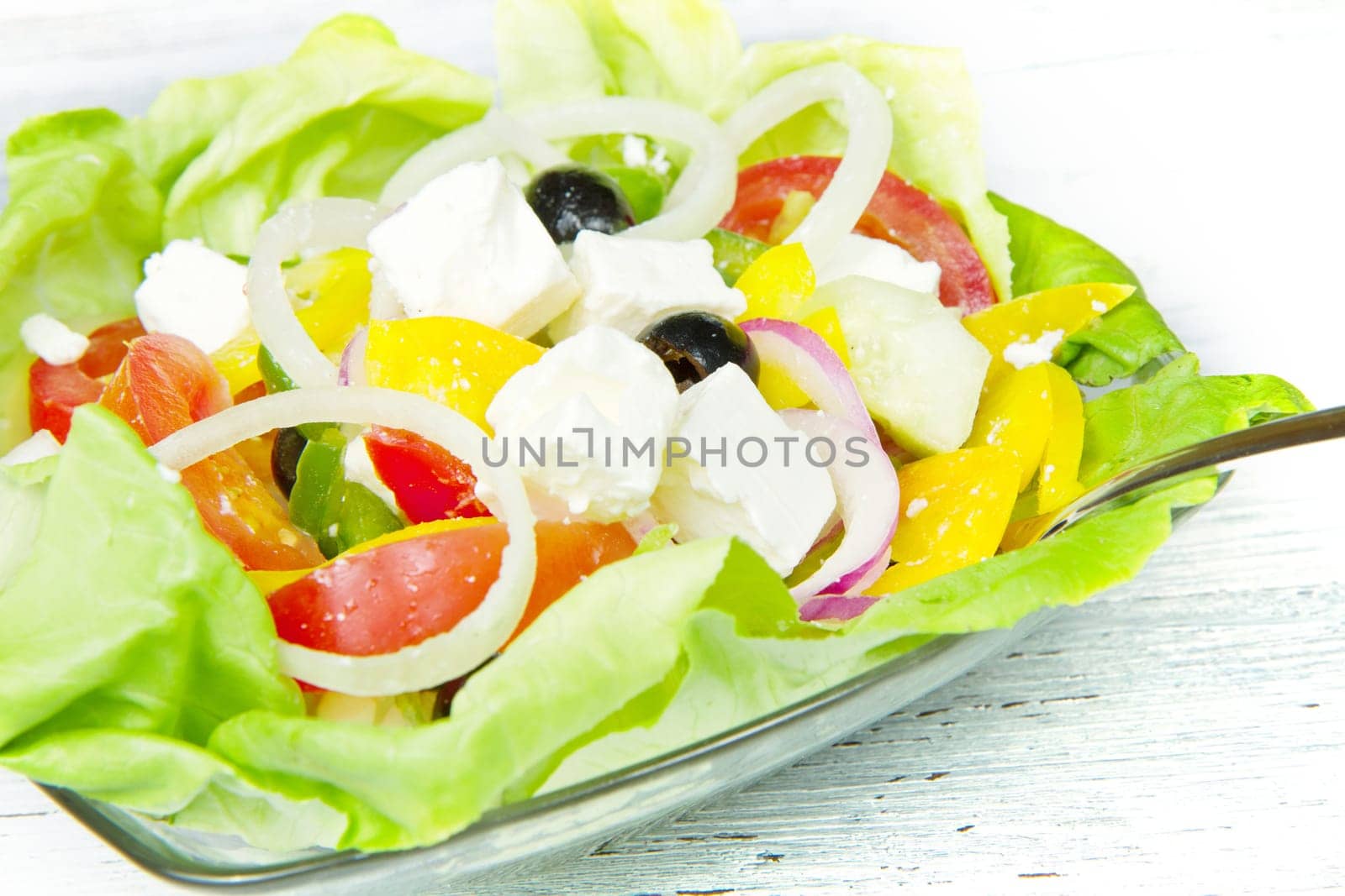 Feta salad with tomatoes, black olives  and fresh vegetables