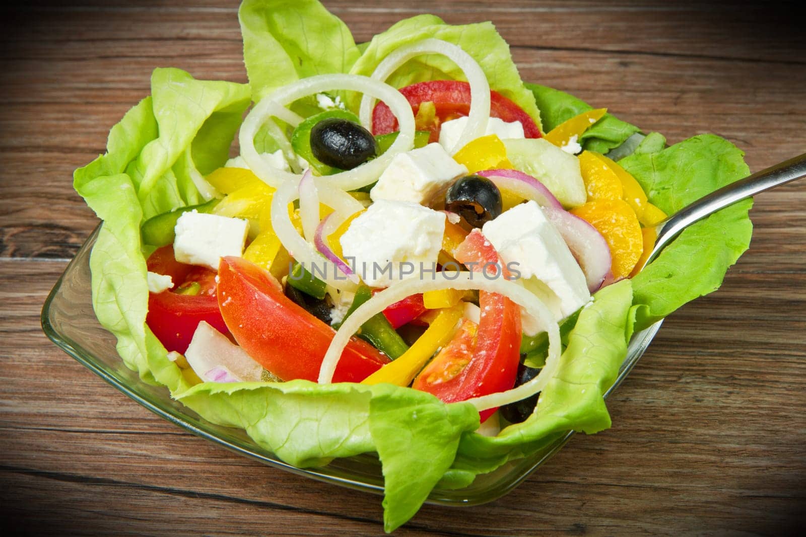 Feta salad with tomatoes, black olives  and fresh vegetables
