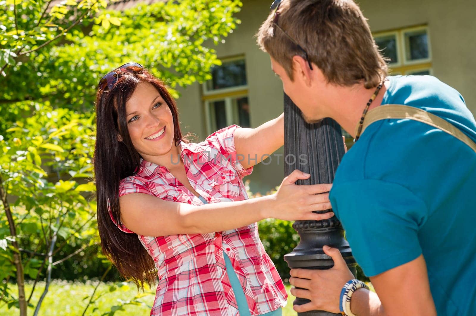 Happy young couple looking at each other with love