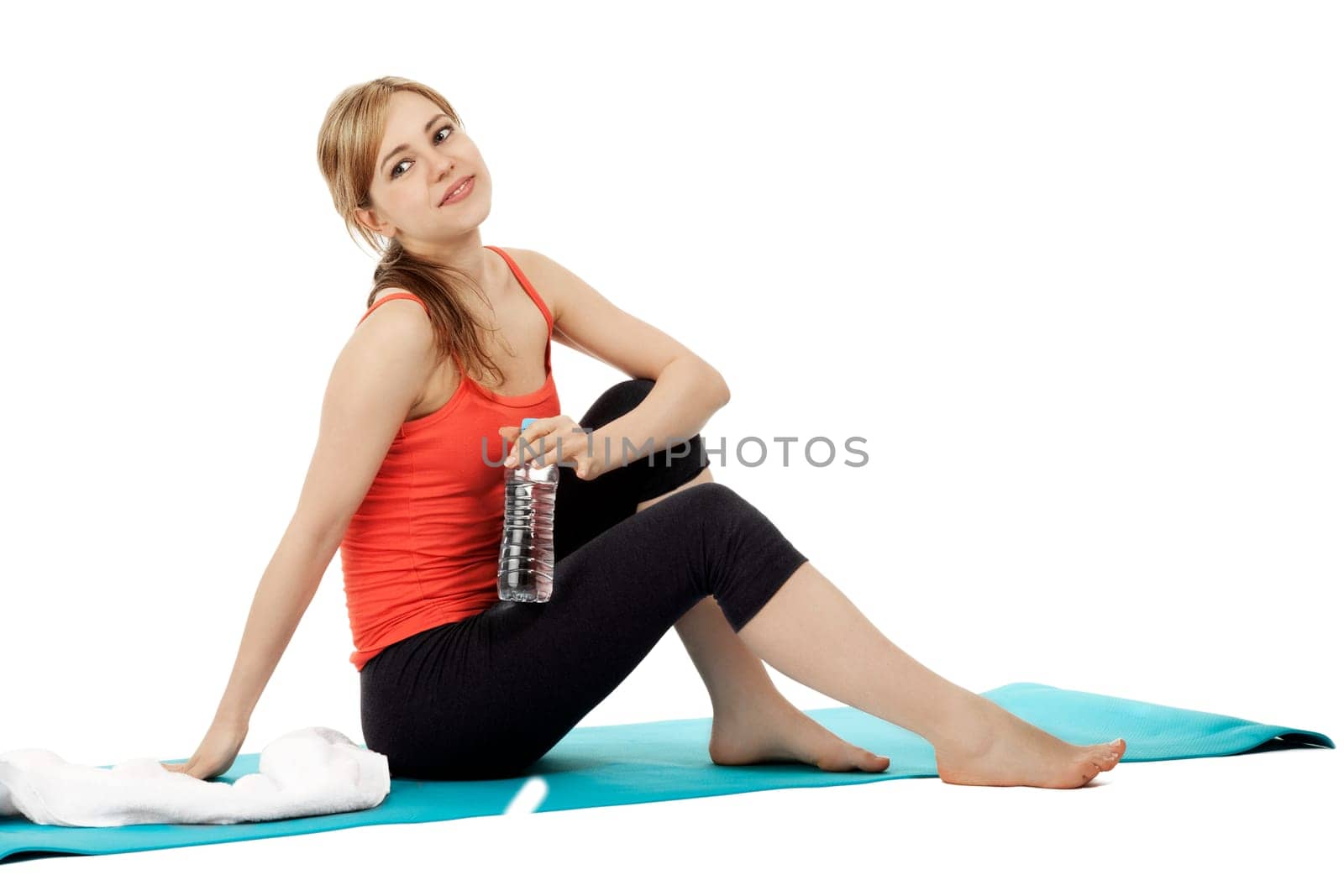 Sportswoman taking a break on white background